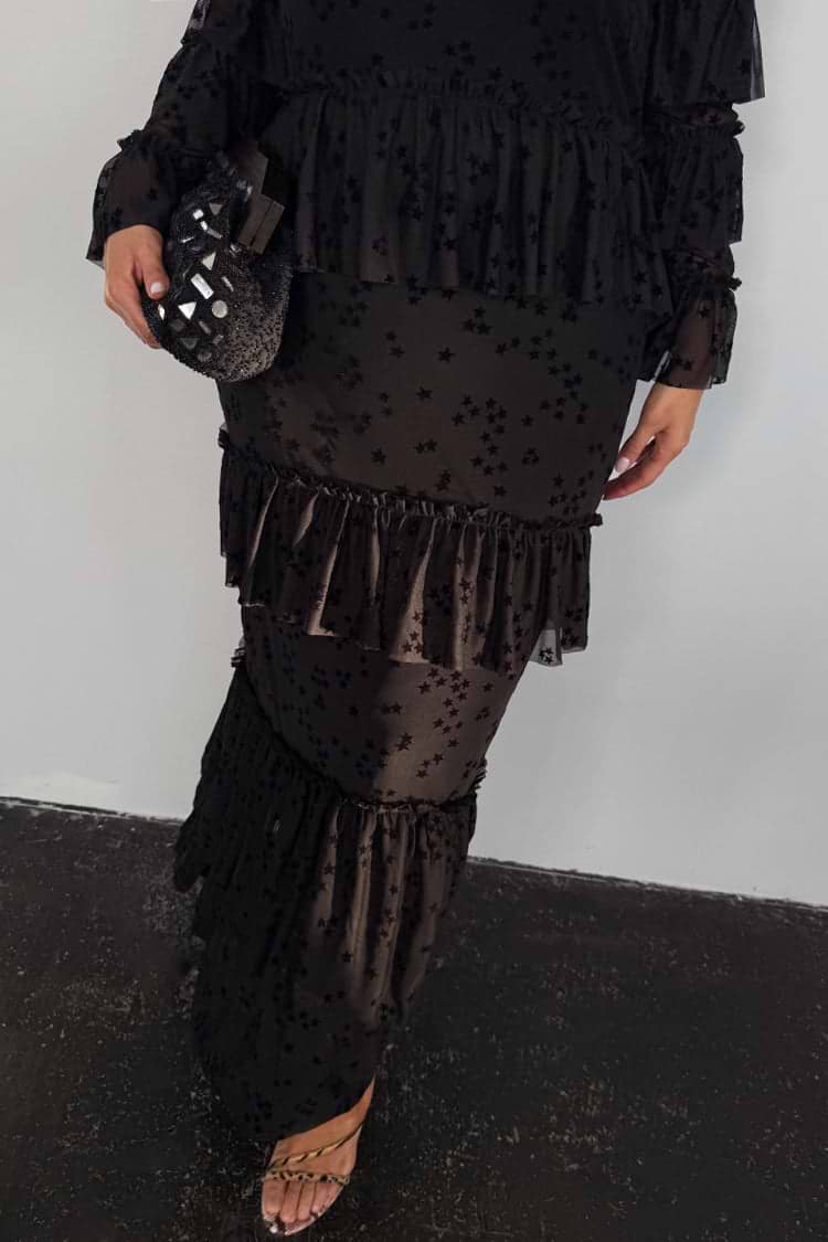 Black Star Devore Felicity Dress with tiered mesh ruffles and velvet star motifs, highlighting inclusive sizing.