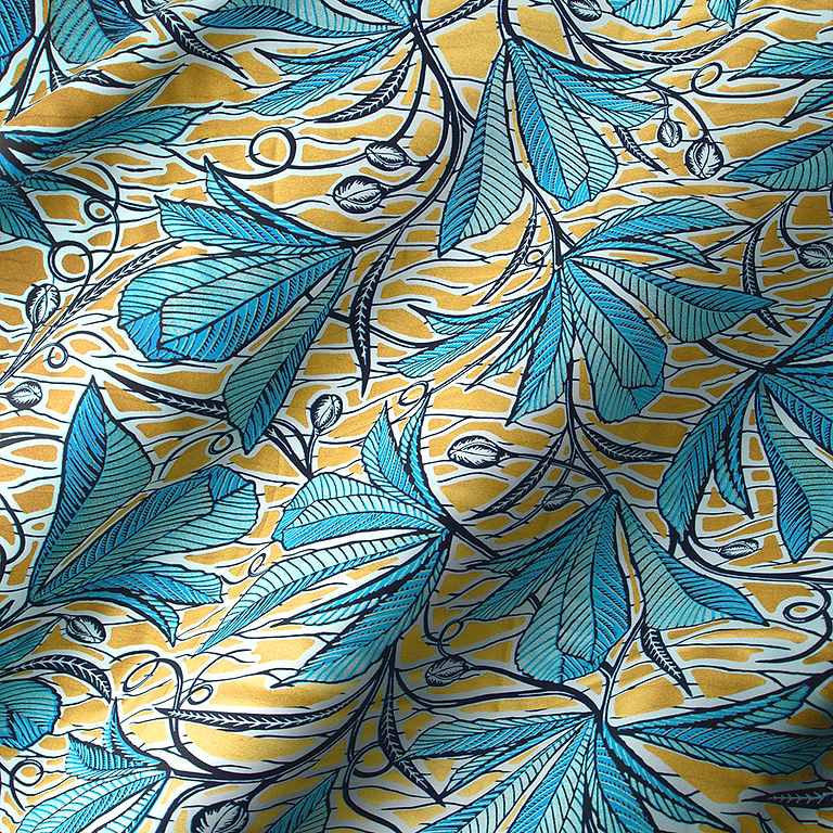 Gold patterned fabric with blue vines and leaves