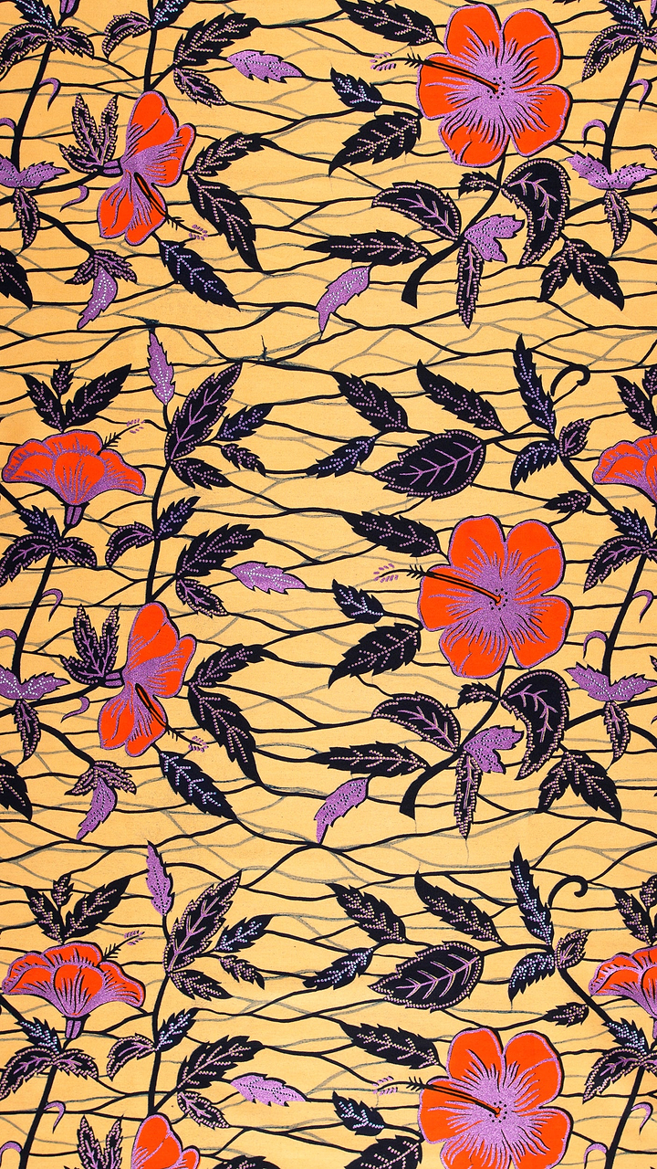 Vibrant orange purple hibiscus flowers wax hollandais vl00921.282