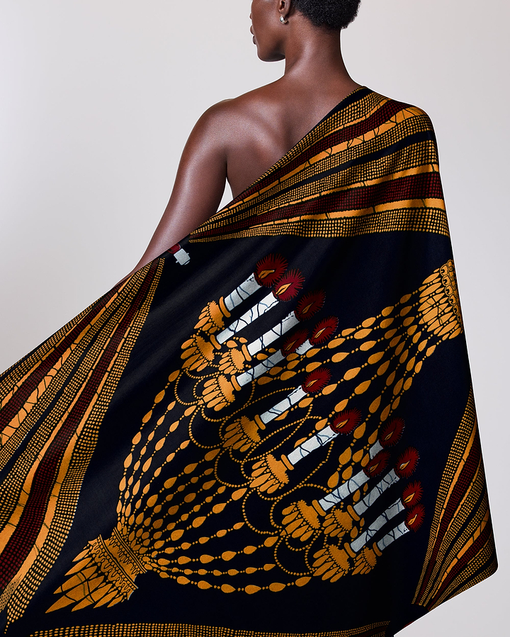 Woman wears black gold maroon wax hollandais vl00927.080
