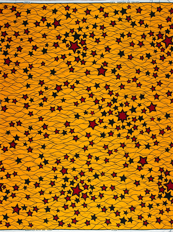 Vibrant orange fabric adorned dense wax hollandais vl00954.138