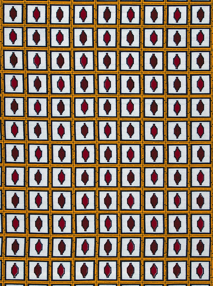 Fabric features geometric pattern red wax hollandais vl01630.027