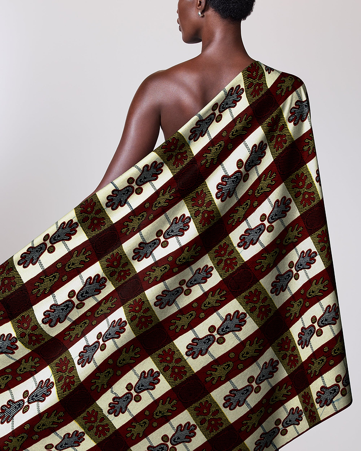 Patterned fabric draped person’s shoulder wax hollandais vl02074.095