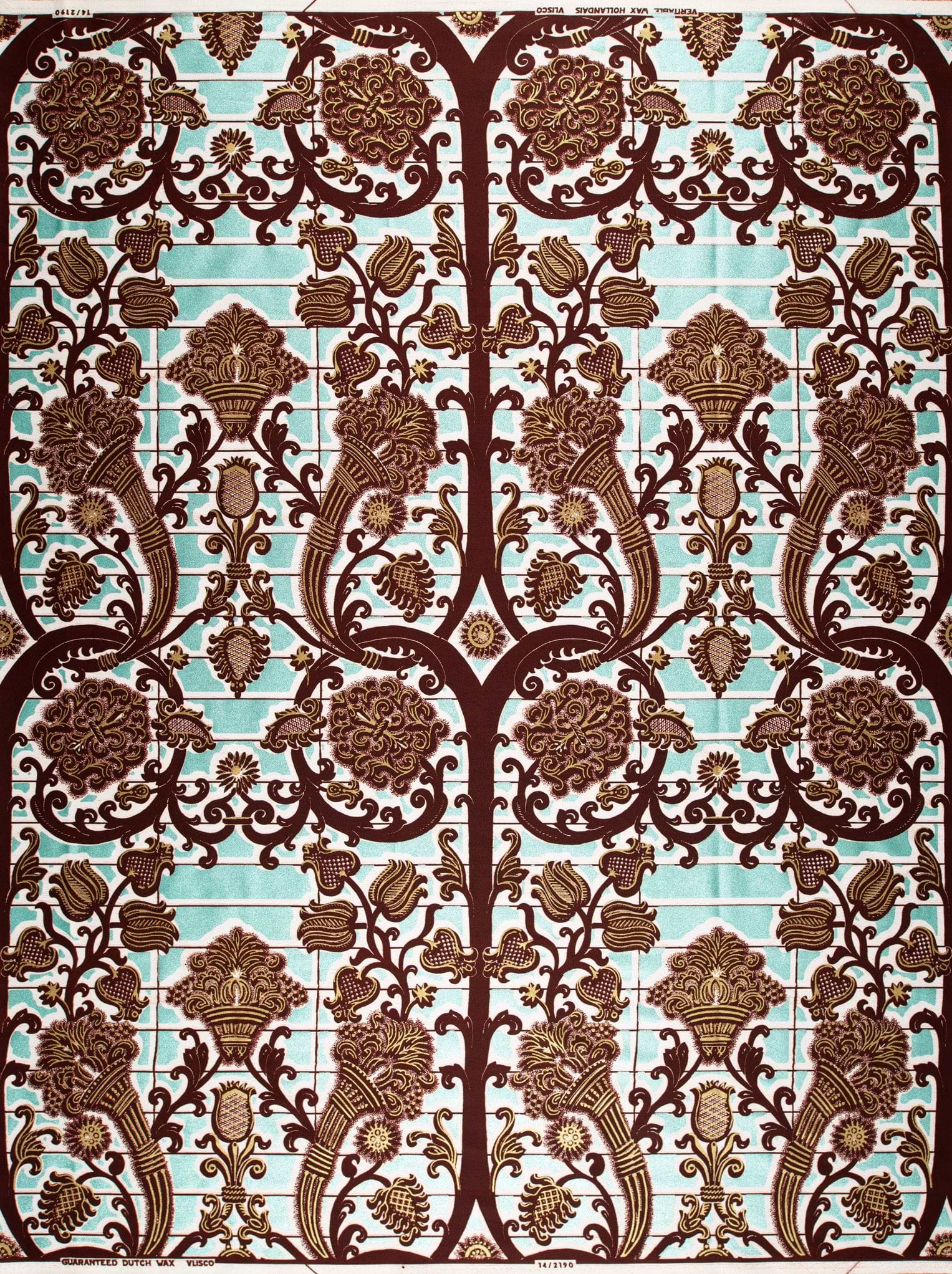 Fabric features ornate symmetrical pattern wax glitterglam