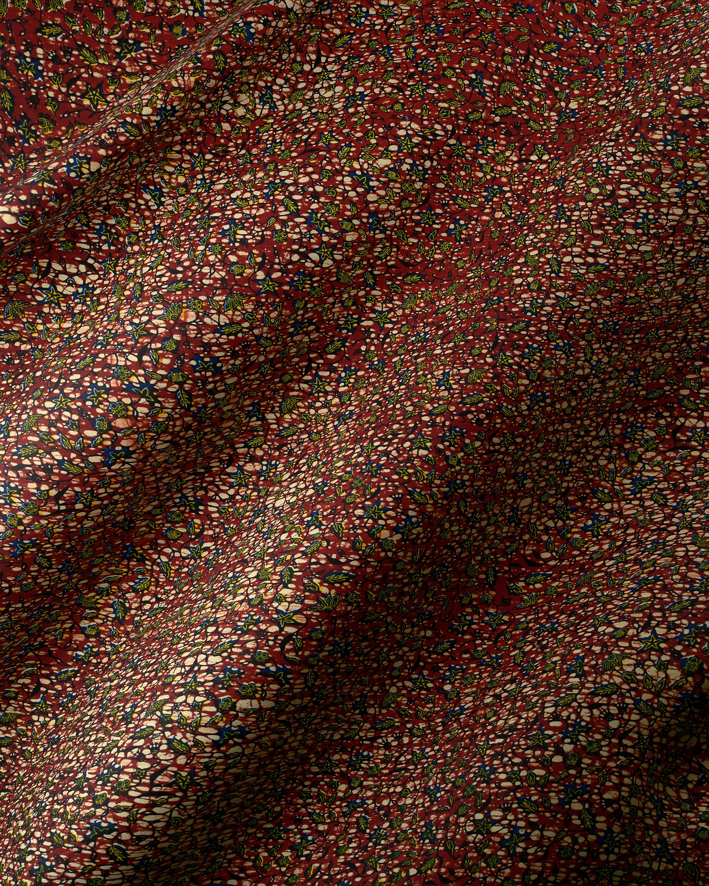 Rich burgundy fabric delicate scattered wax hollandais vl02425.090