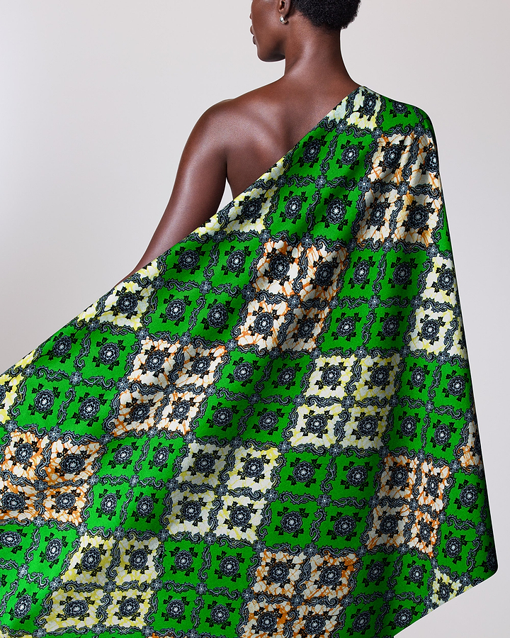 Green patterned fabric draped person’s super-wax vl02789.228