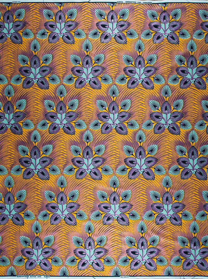 Vibrant orange fabric floral patterns wax hollandais vl03049.017