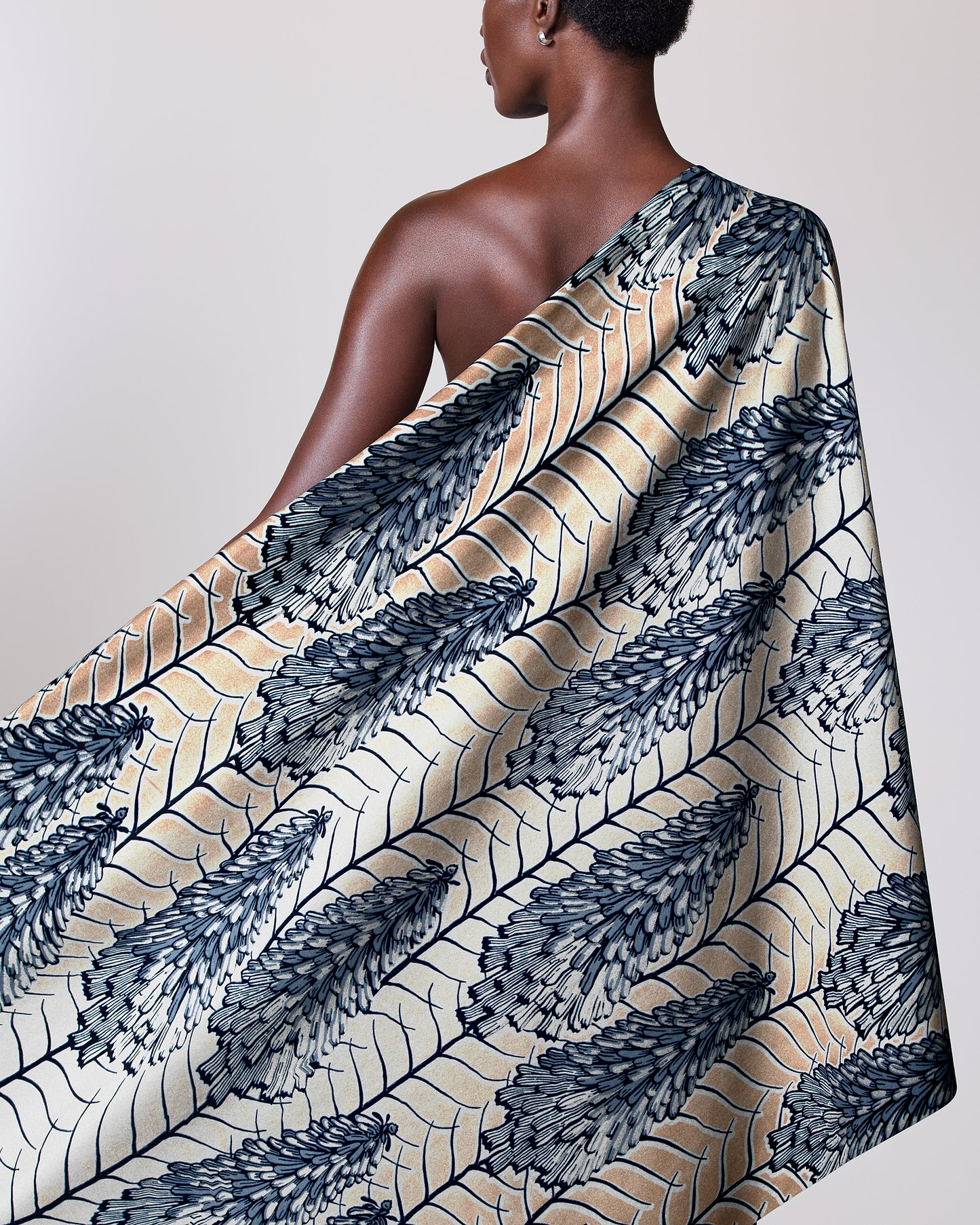 One-shoulder wrap cream base bold wax glitterglam