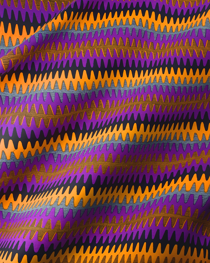 Vibrant purple orange zigzag-patterned fabric wax hollandais vl04787.086
