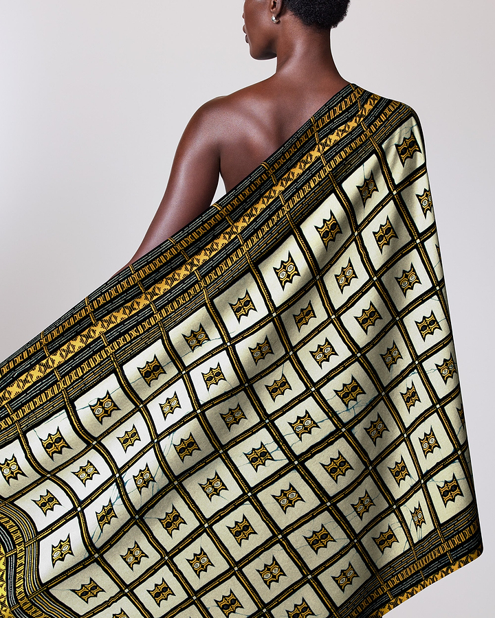 Woman draped cream-colored african print wax hollandais vl08008.254