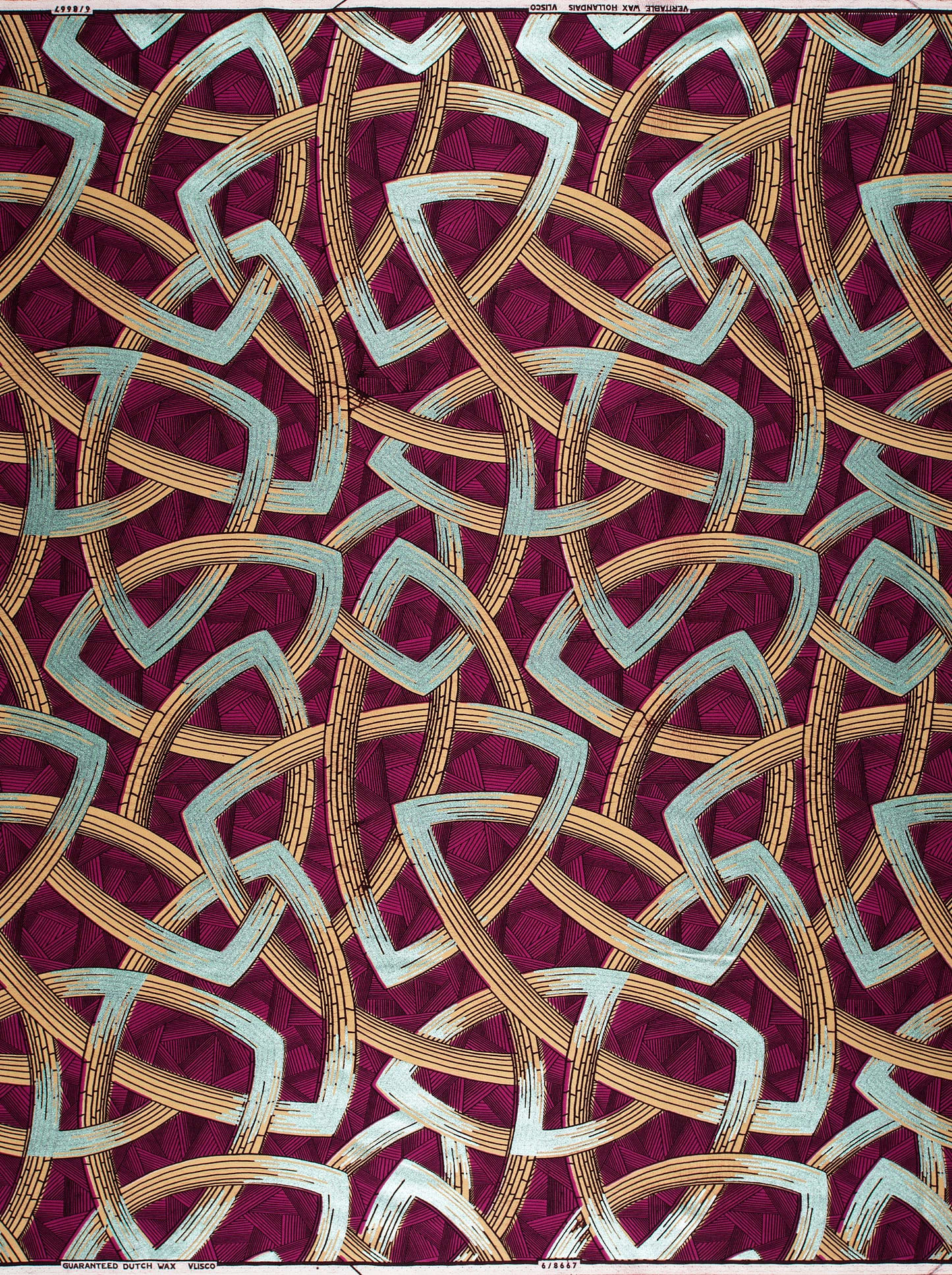 Vibrant maroon fabric intricate geometric wax hollandais vl08667.005