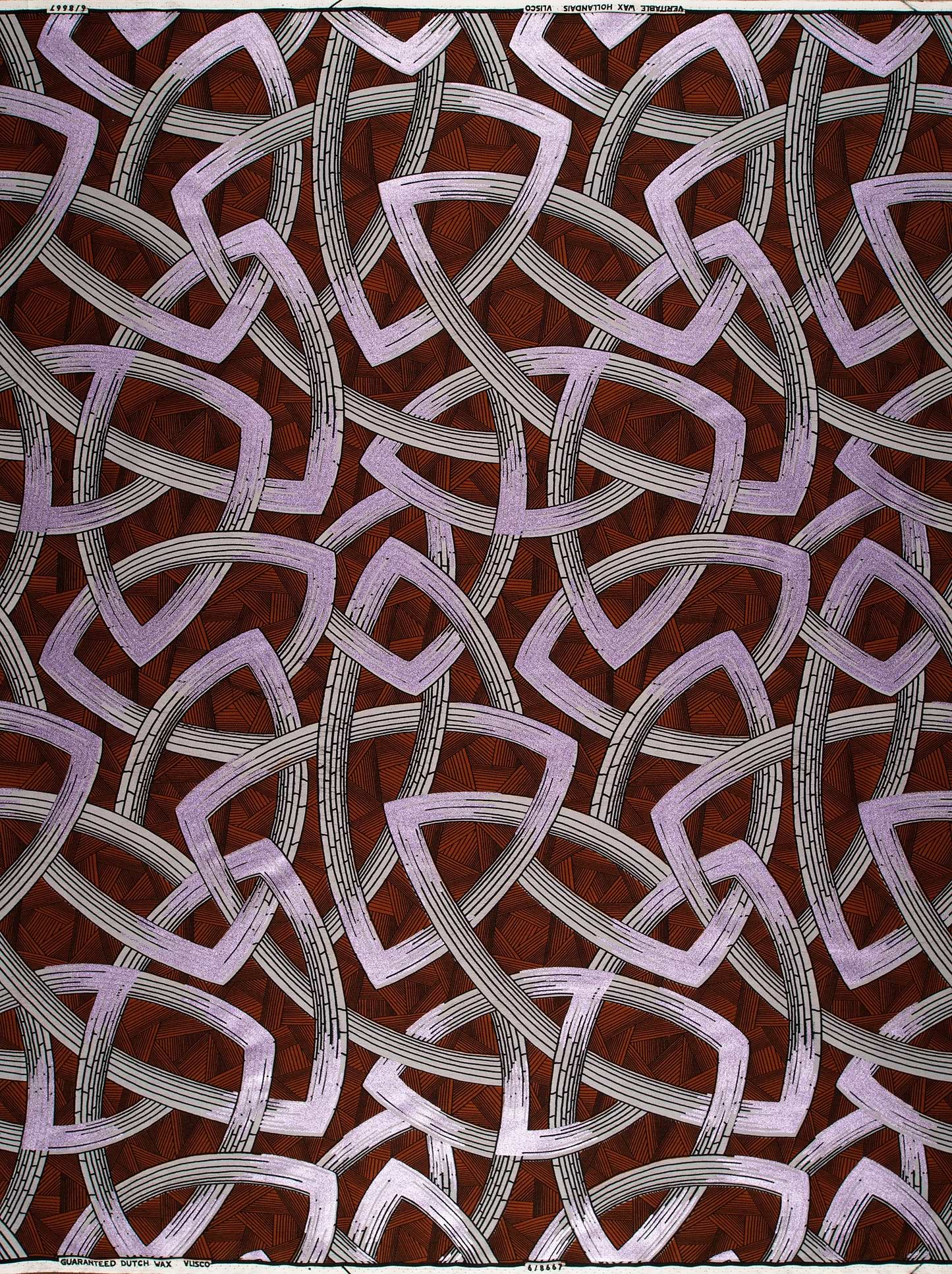 Fabric features intricate geometric pattern wax hollandais vl08667.009