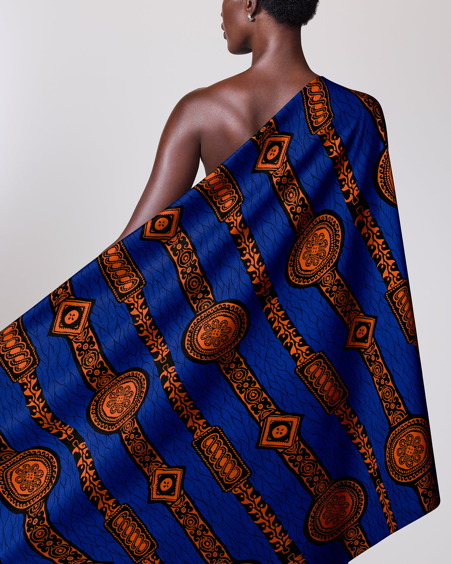 Vibrant blue fabric intricate orange wax hollandais vl0h599.174