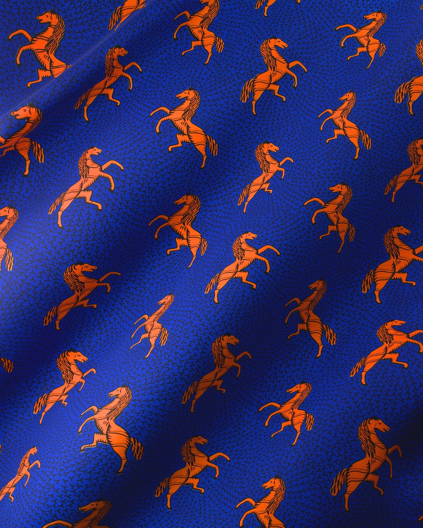 Blue fabric pattern orange horses wax hollandais vl53500.131