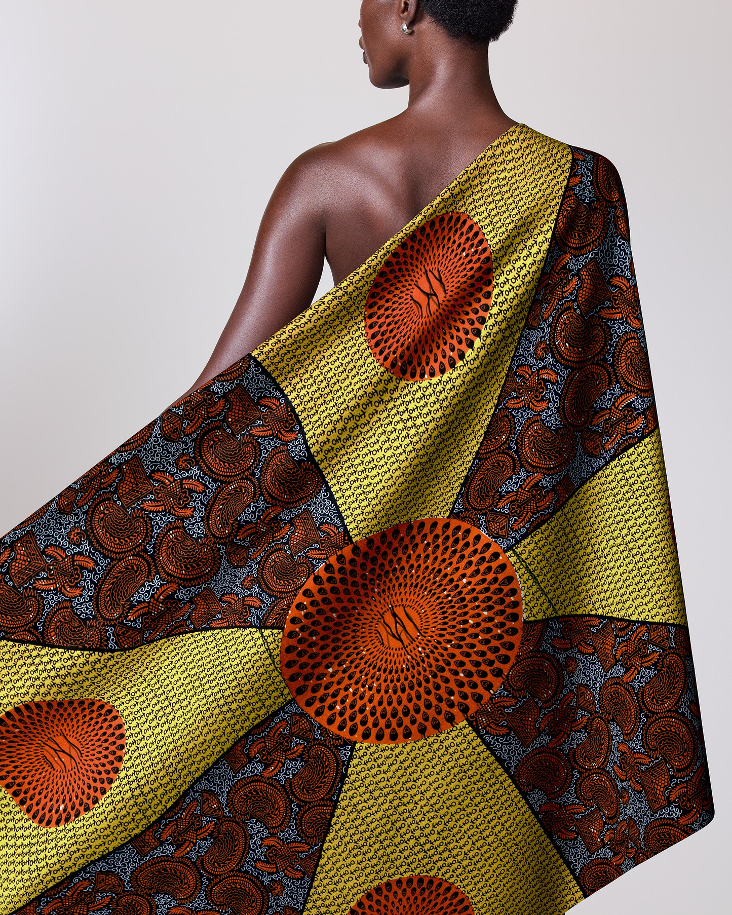 Colorful patterned fabric draped person’s wax hollandais vl55650.106