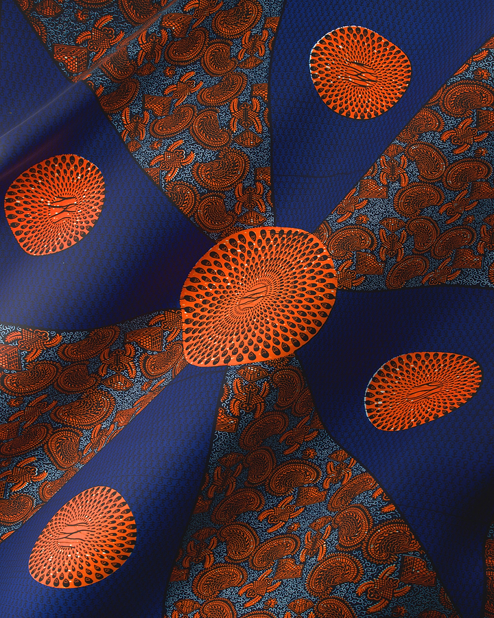 Vibrant orange blue patterned fabric wax hollandais vl55650.140