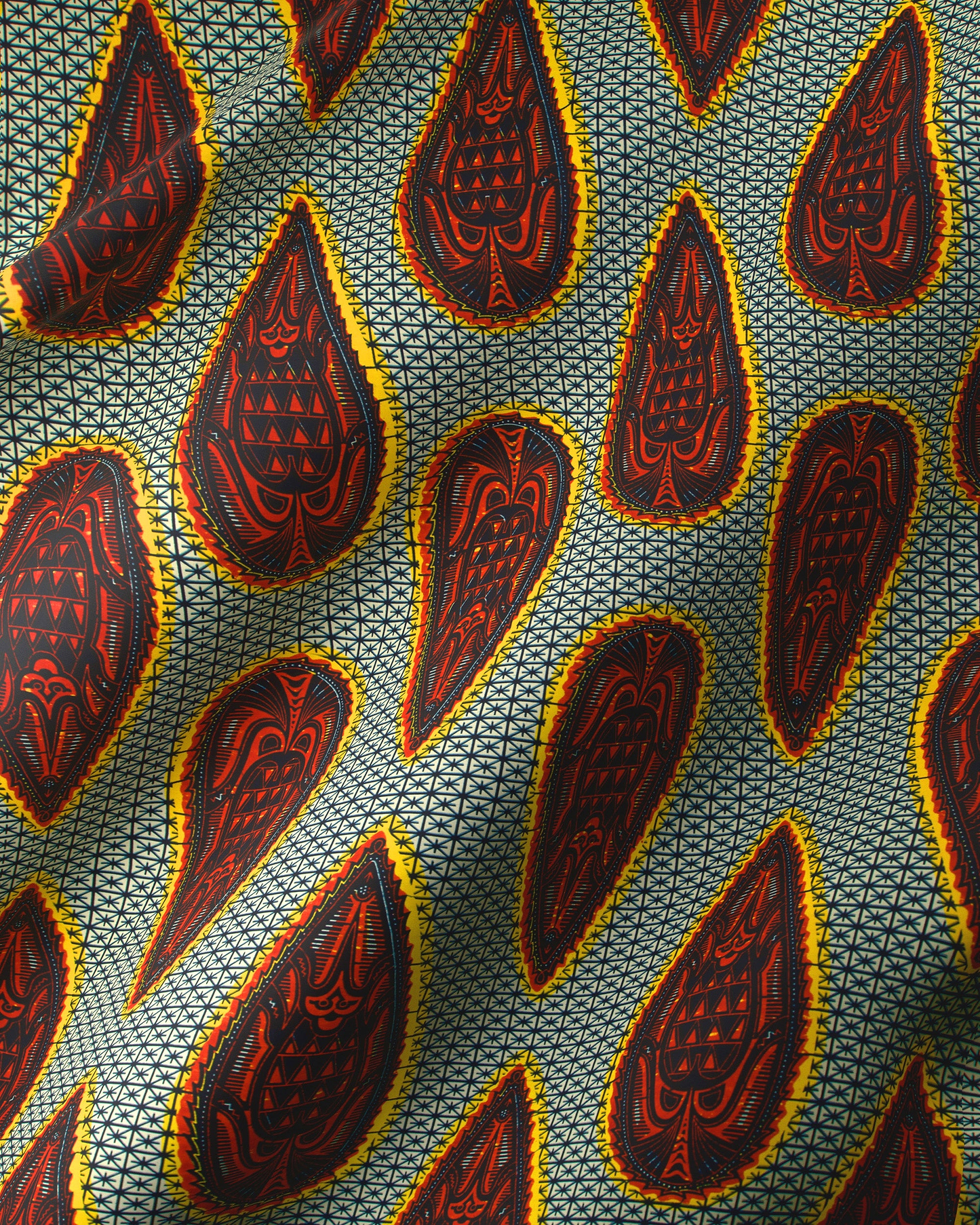 Vibrant red yellow tribal-patterned teardrop wax hollandais vl77150.027