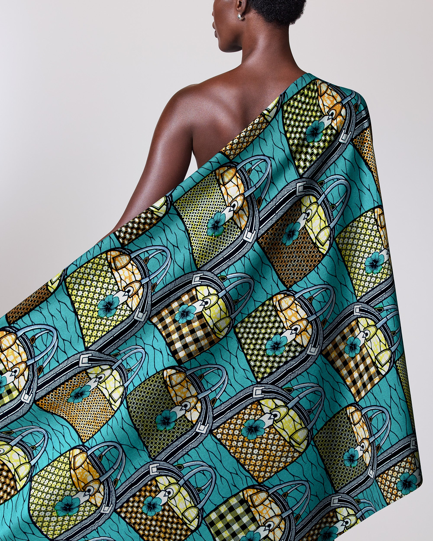 Vibrant patterned fabric draped person super-wax vla1106.107