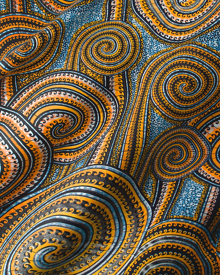 Vibrant orange black spiral-patterned fabric grand super-wax vls0388.006