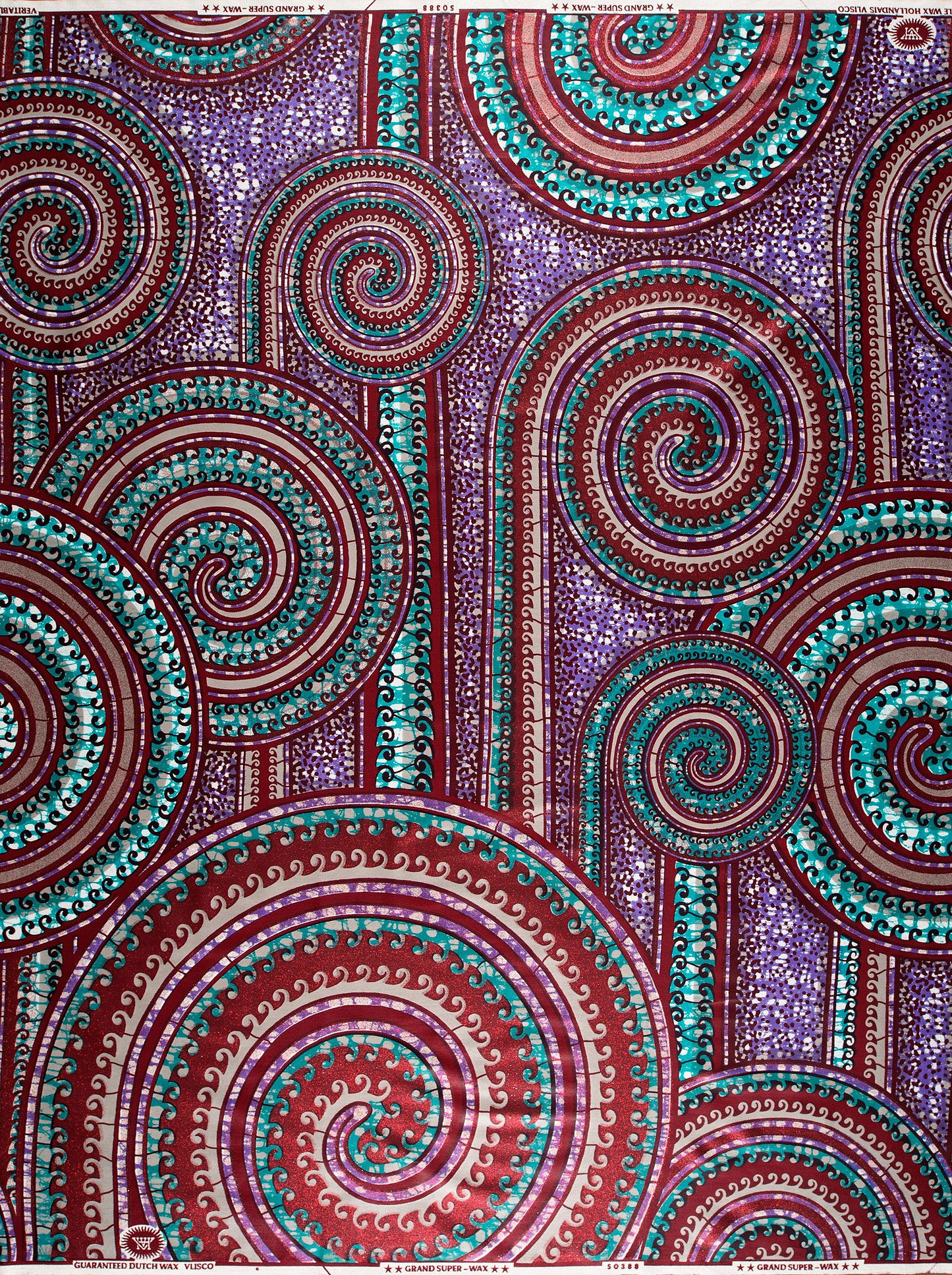 Vibrant patterned fabric deep purples grand super-wax vls0388.007