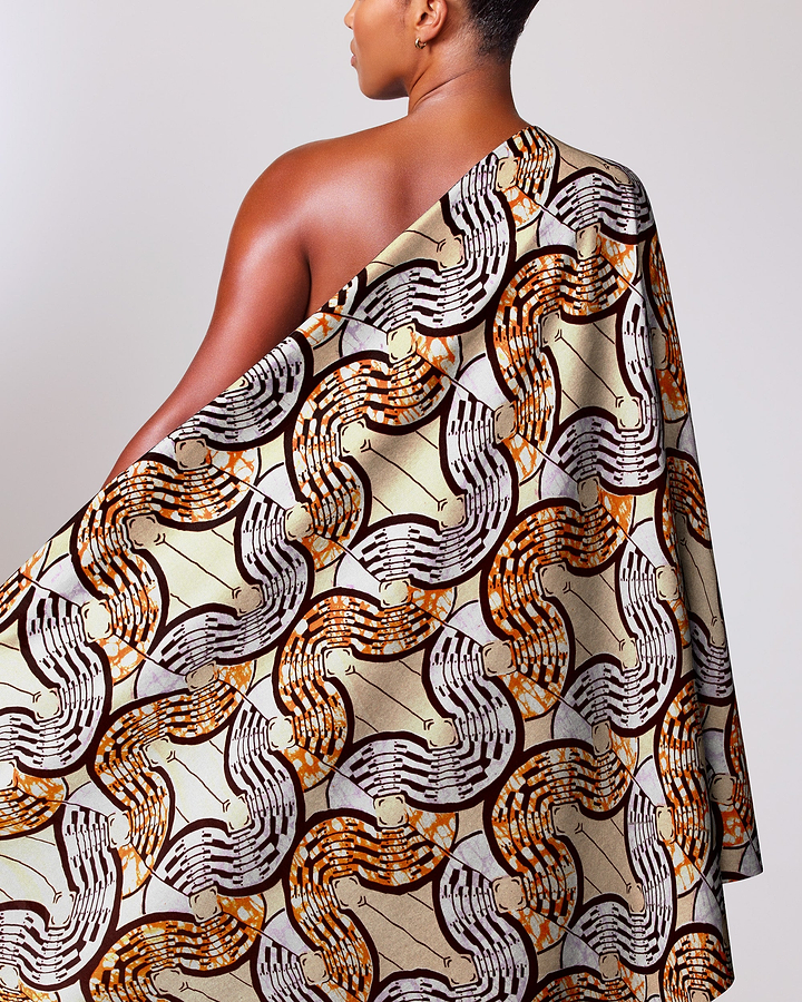 Woman wears one-shoulder garment made super-wax vls0476.012