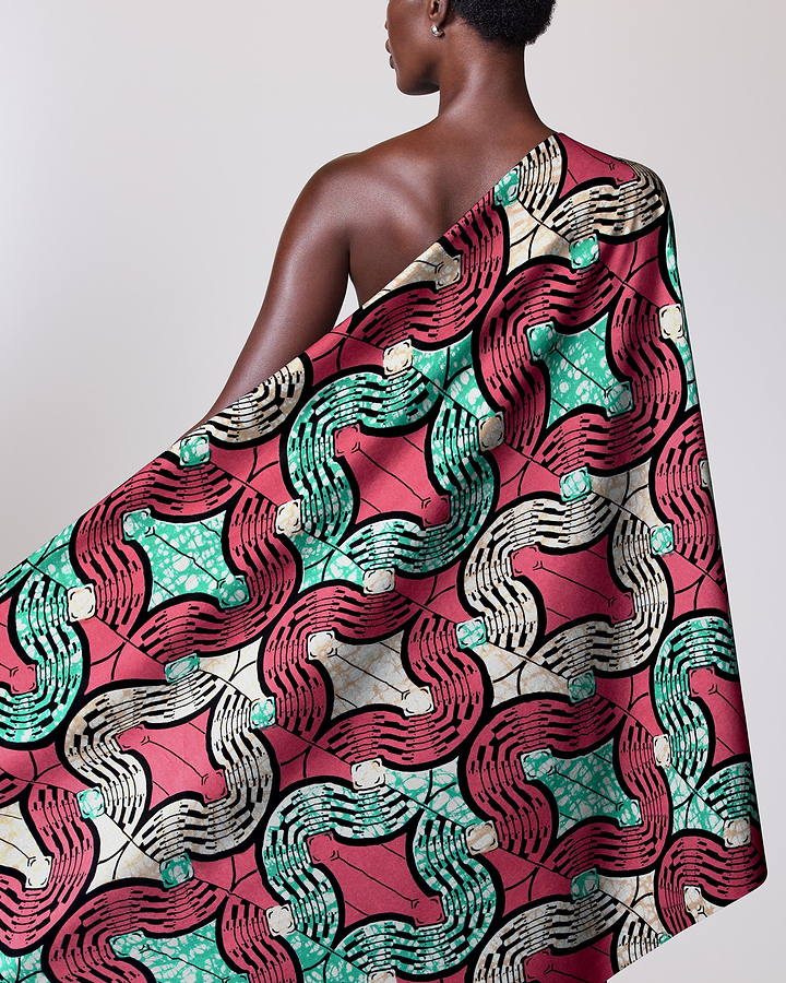 Vibrant patterned fabric draped model’s super-wax vls0476.013