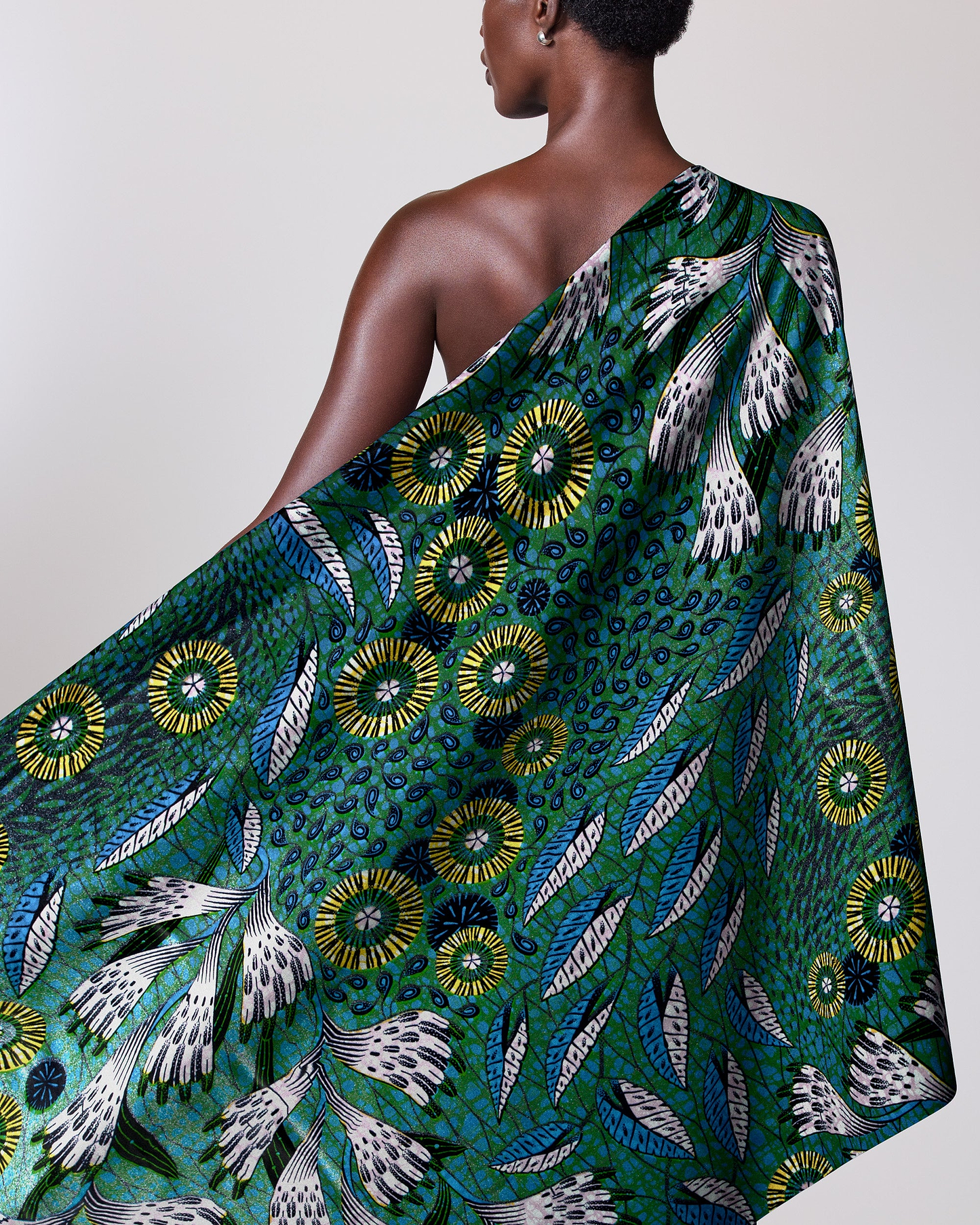 Green patterned fabric draped person grand super-wax vls1690.001