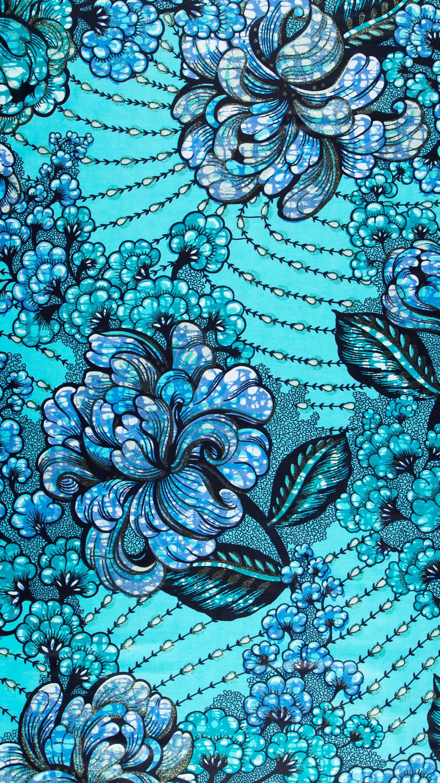 Vibrant turquoise fabric adorned intricate grand super-wax vls3034.008