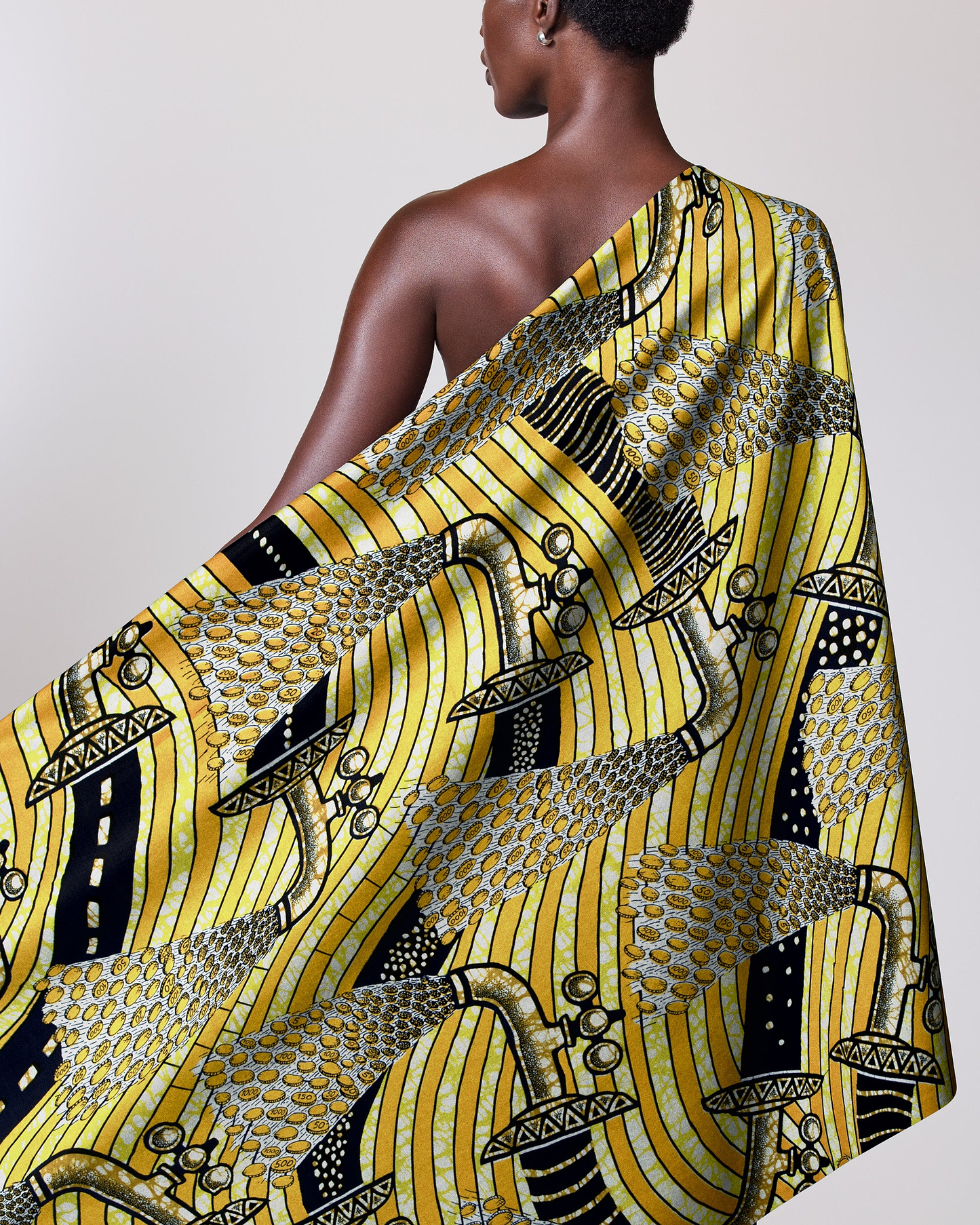 Yellow patterned fabric draped person super-wax vls3071.012