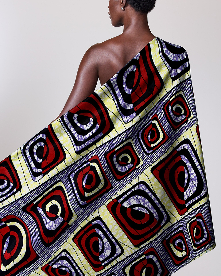 Vibrant patterned fabric draped model’s super-wax vls4163.010