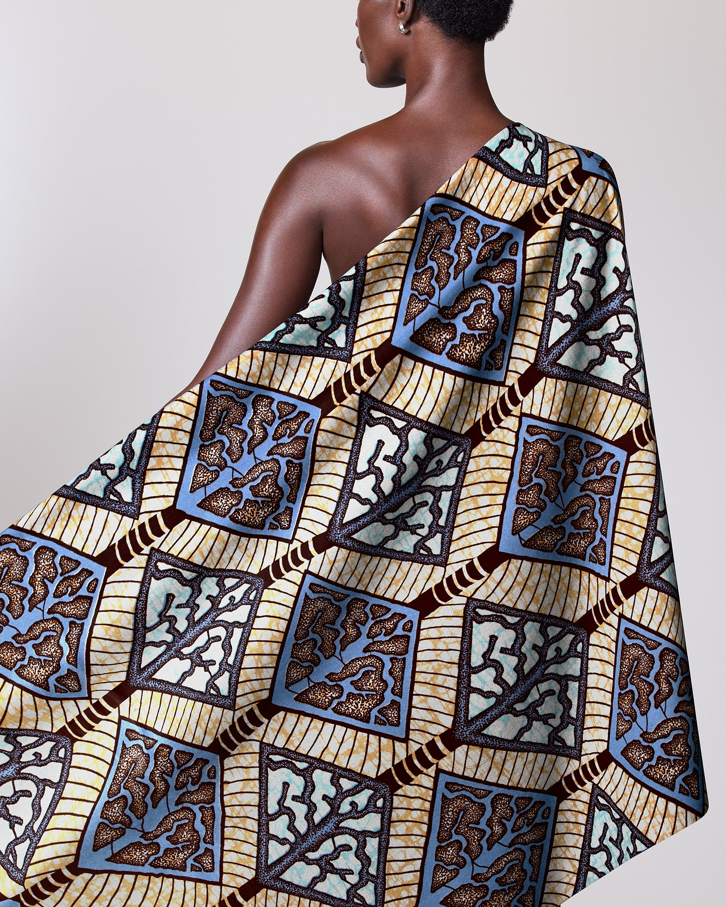 Vibrant geometrically patterned fabric draped super-wax vls4398.014
