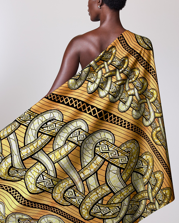 Woman draped vibrant golden-yellow silk super-wax vls4959.017