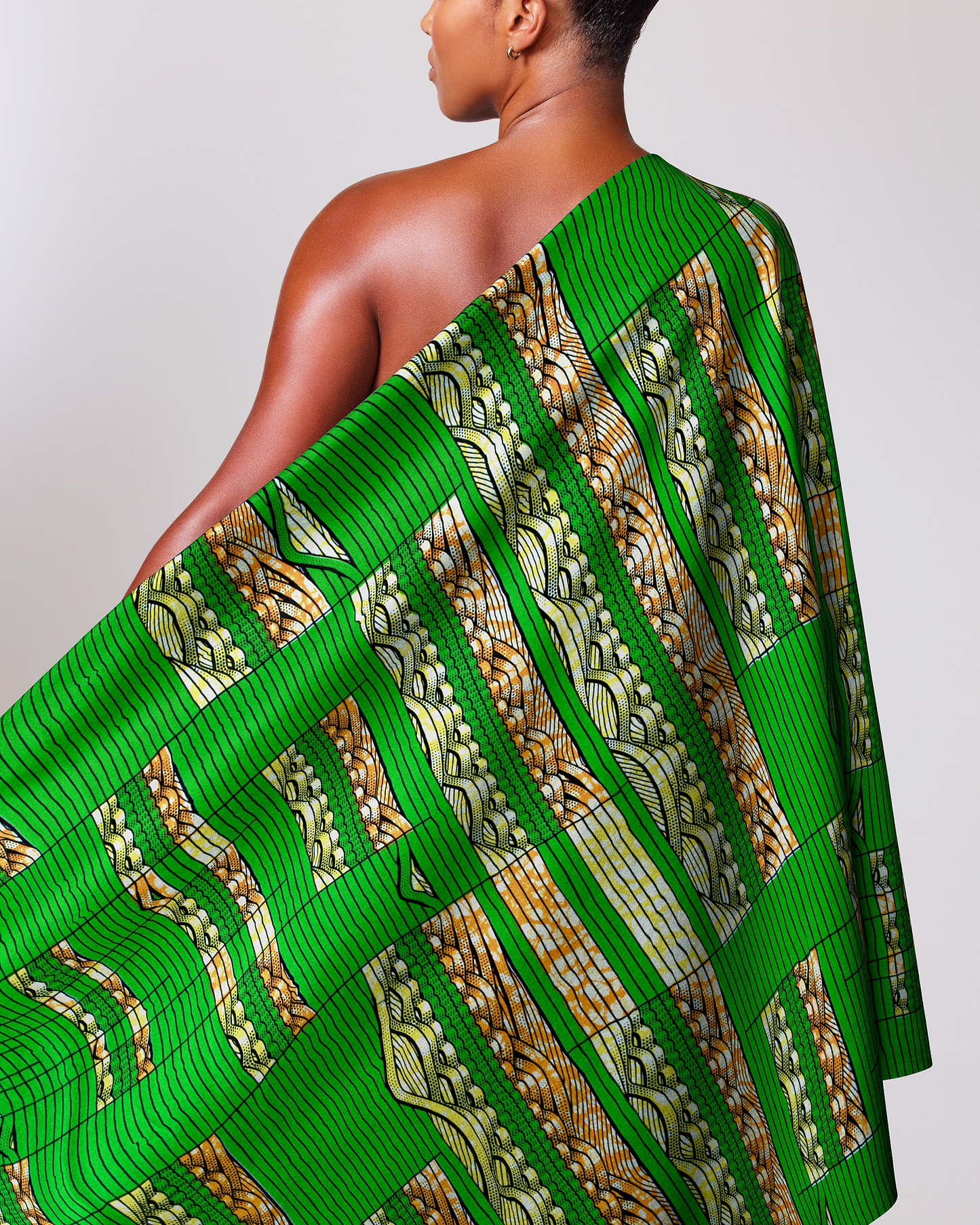 Vibrant green gold patterned fabric super-wax vls6220.013