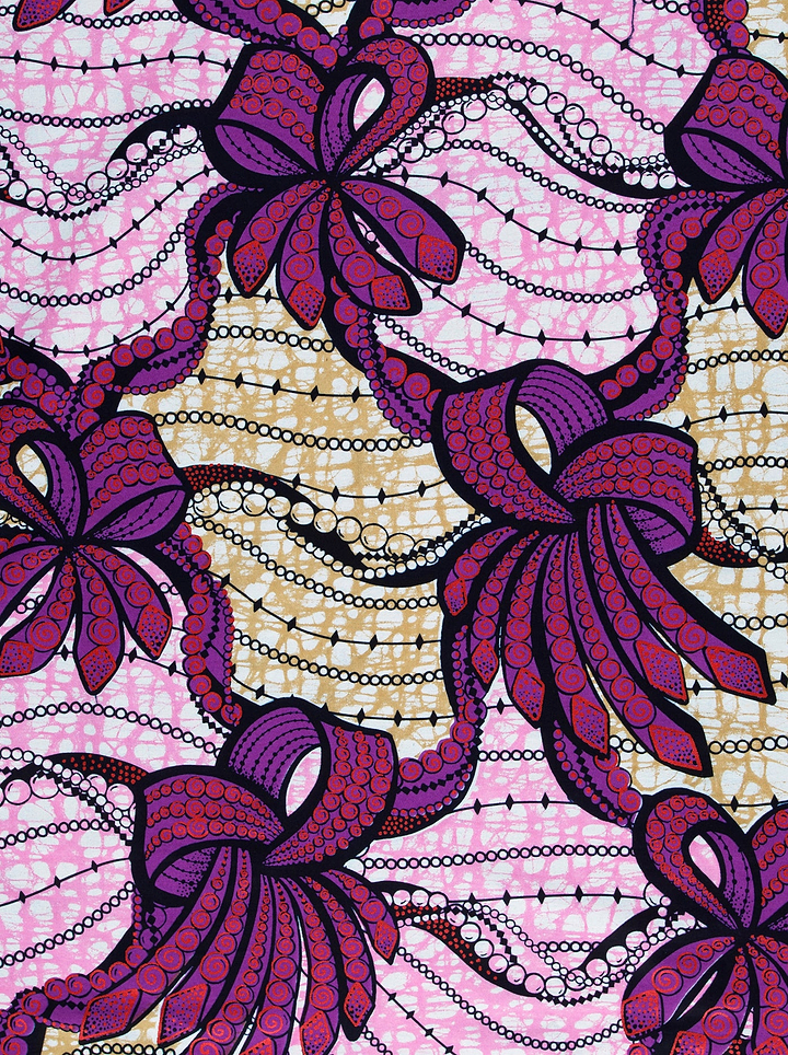Vibrant purple floral bow-patterned fabric super-wax vls6394.025