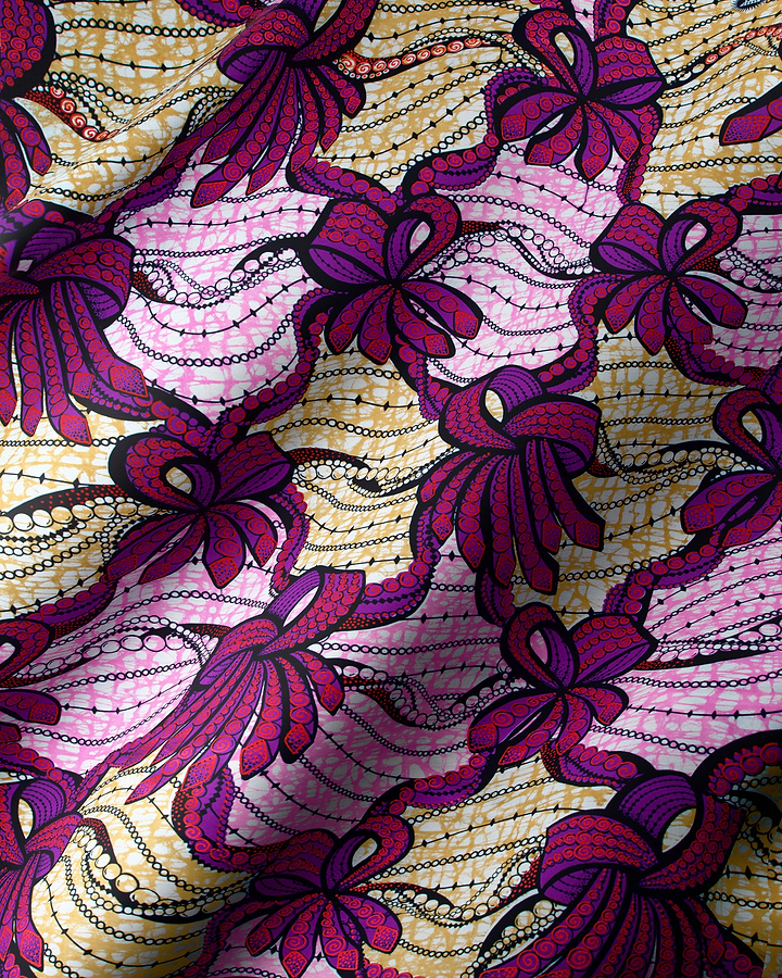 Vibrant purple pink bow-patterned fabric super-wax vls6394.025
