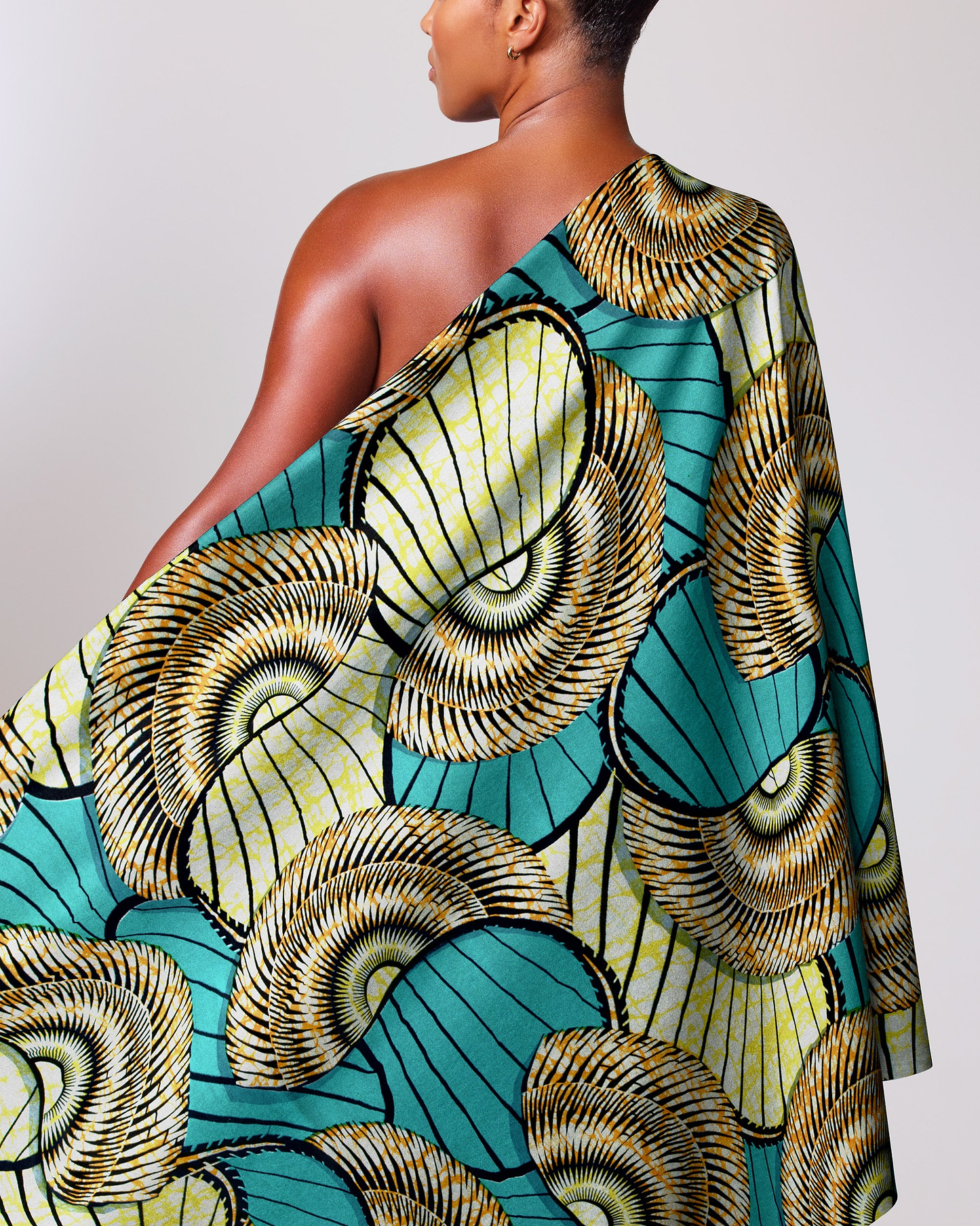 Vibrant turquoise gold patterned fabric super-wax vls7254.007