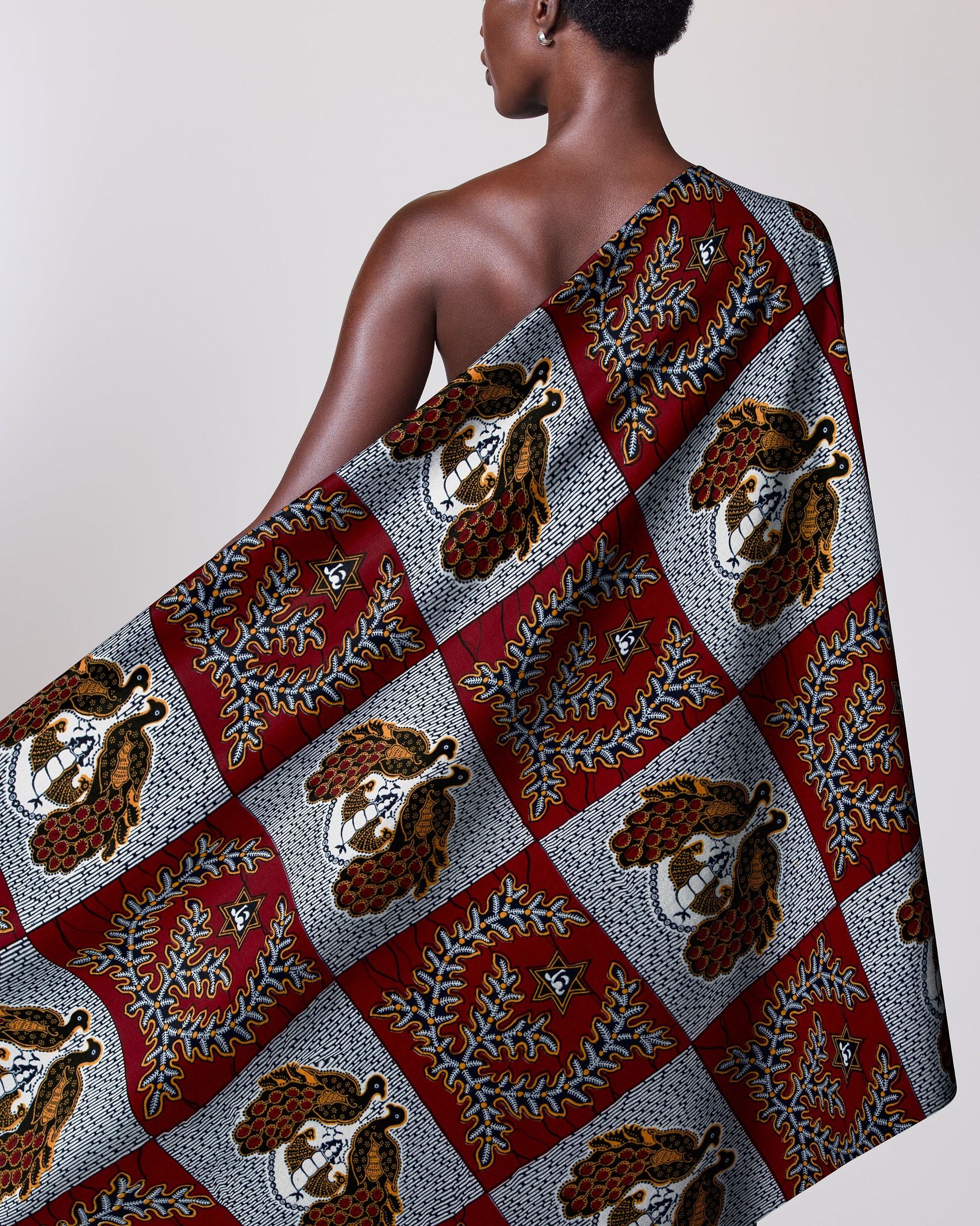 Patterned fabric draped person’s shoulder wax hollandais vl00770.087