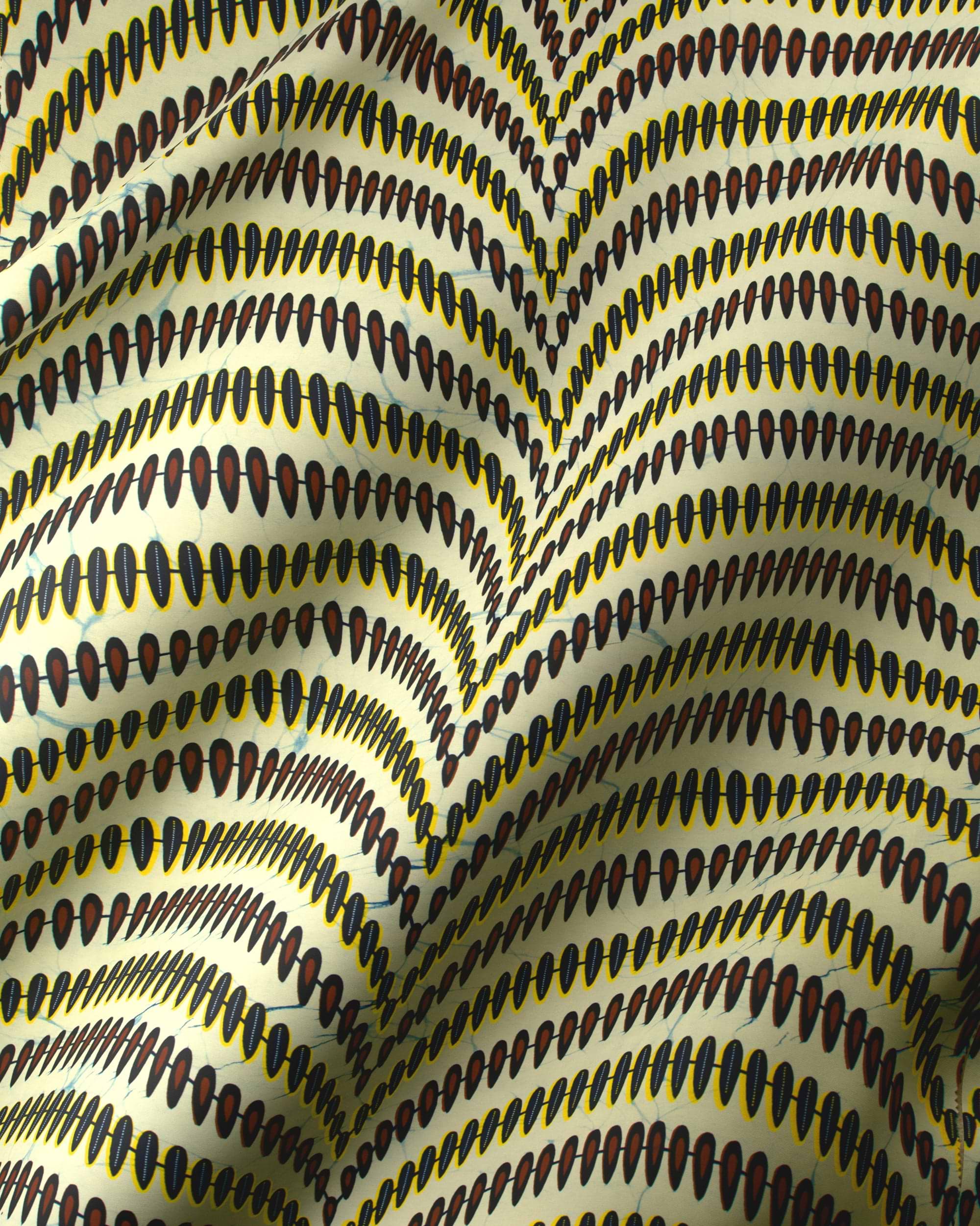 Fabric features bold pattern black wax hollandais vl01682.123
