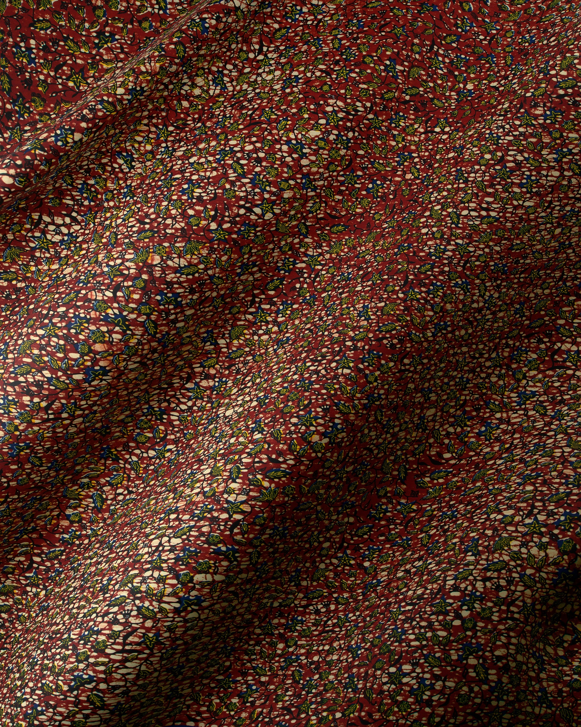Rich burgundy fabric delicate scattered wax hollandais vl02425.090