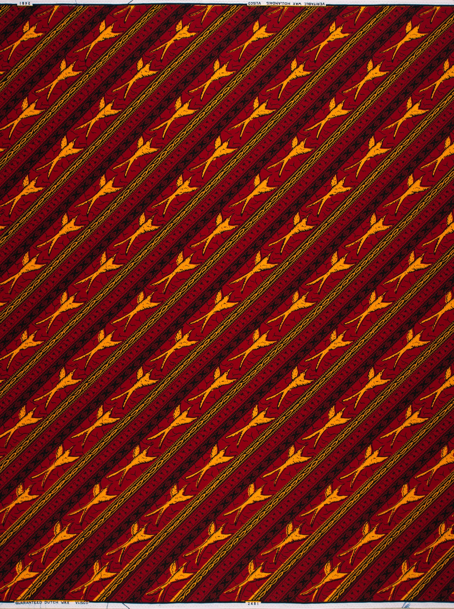Rich crimson fabric diagonal stripes wax hollandais vl02481.056