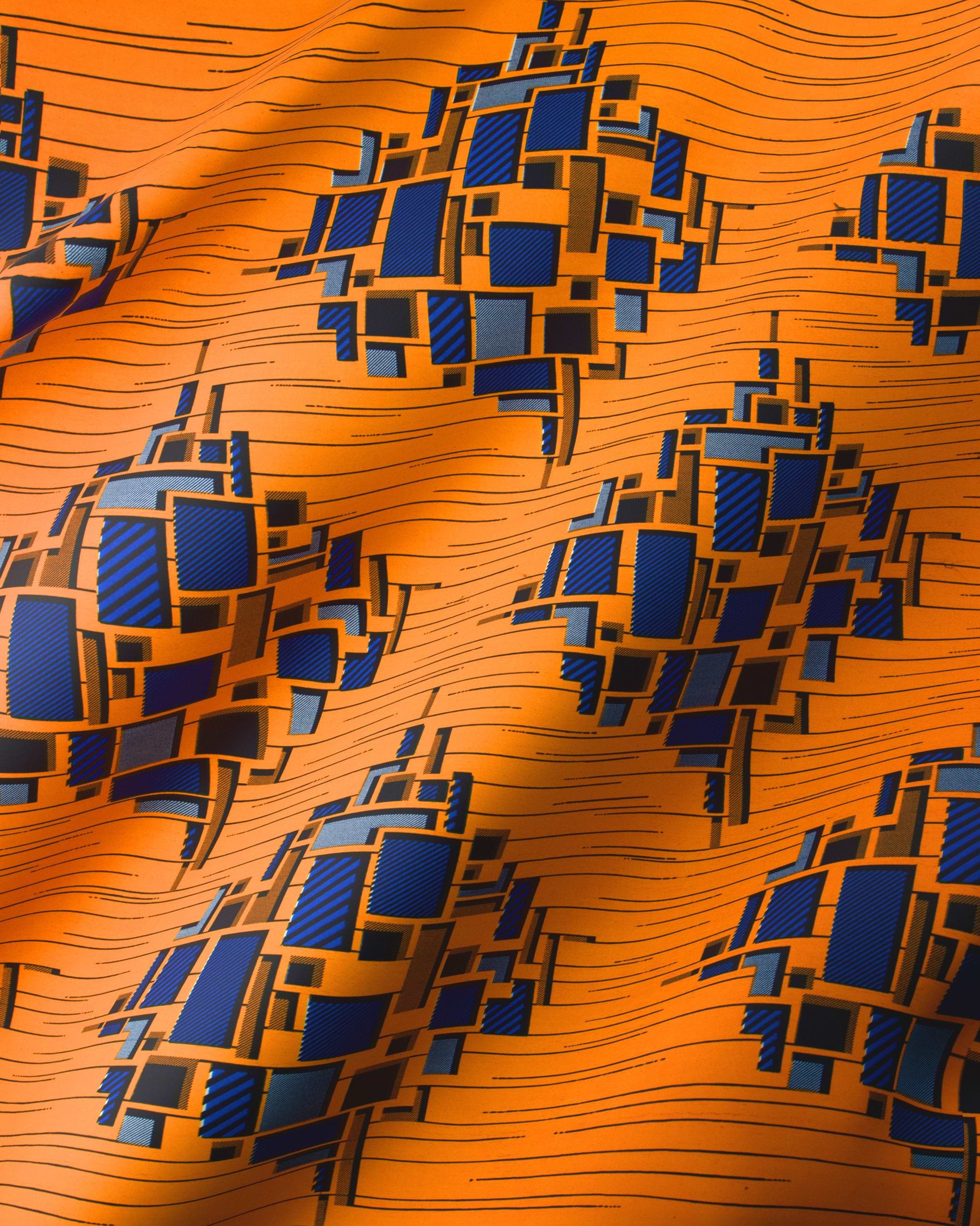 Orange fabric geometric diamond pattern wax hollandais vl03826.144