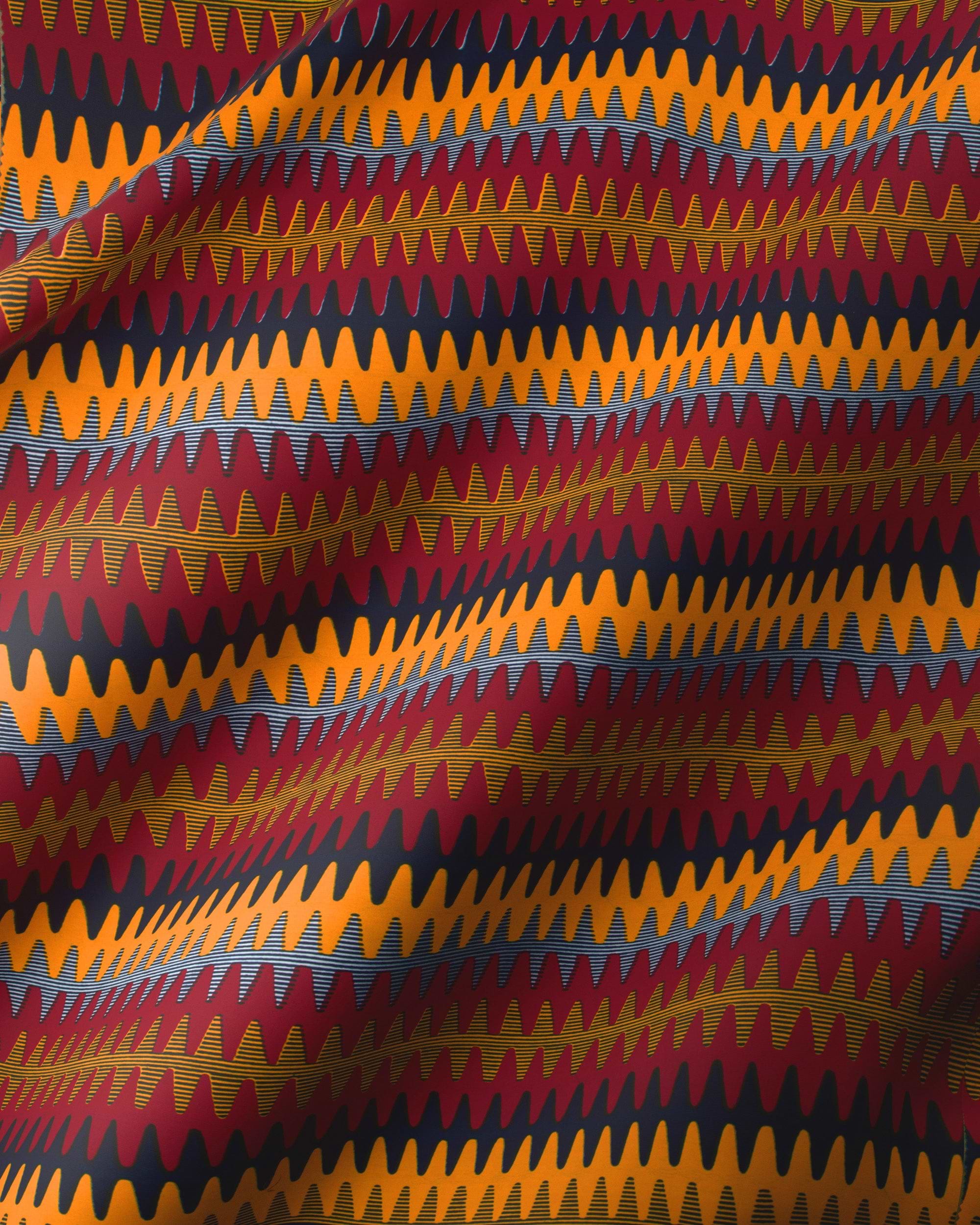 Vibrant red orange zigzag-patterned fabric wax hollandais vl04787.082