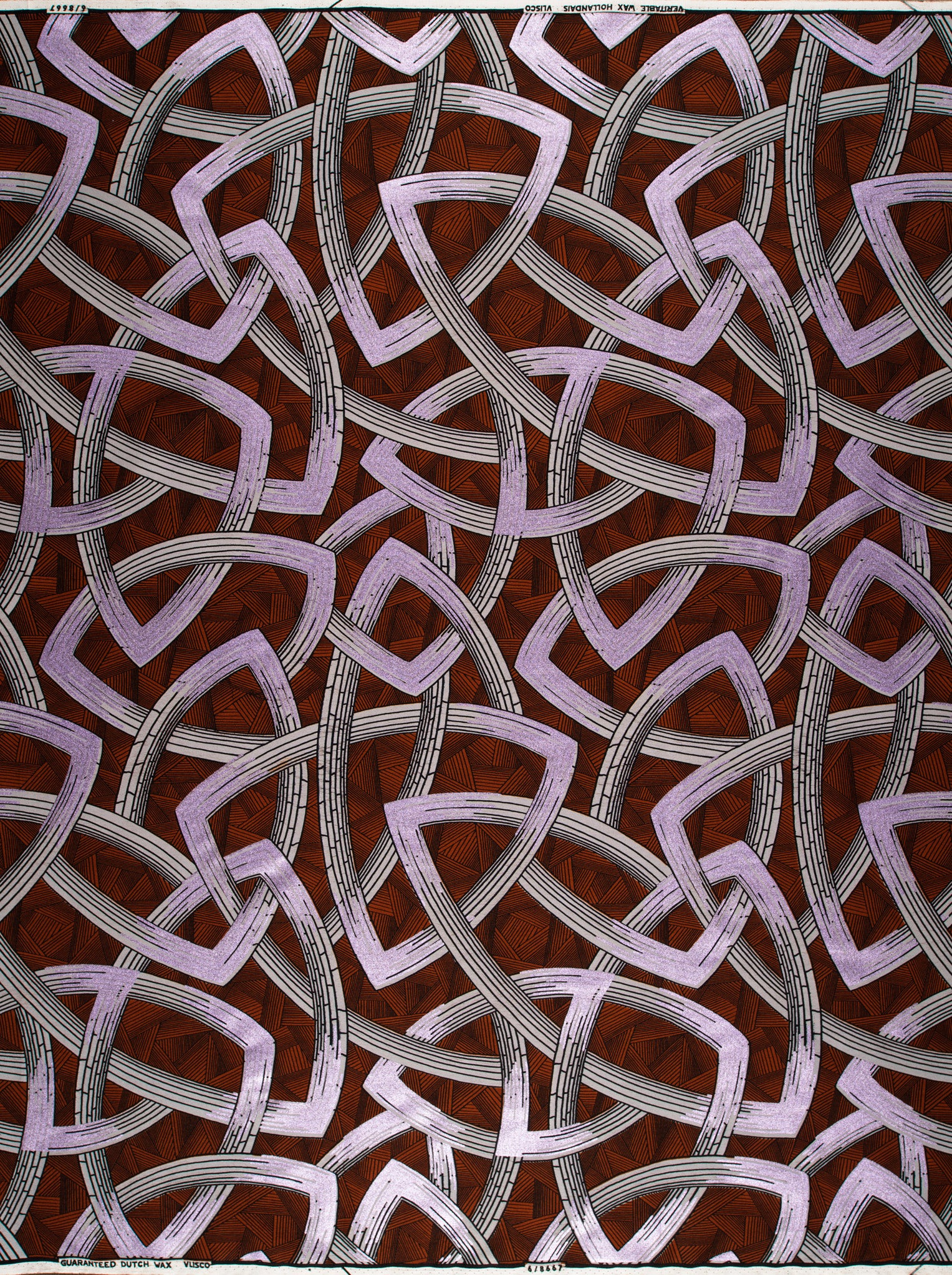 Fabric features intricate geometric pattern wax hollandais vl08667.009
