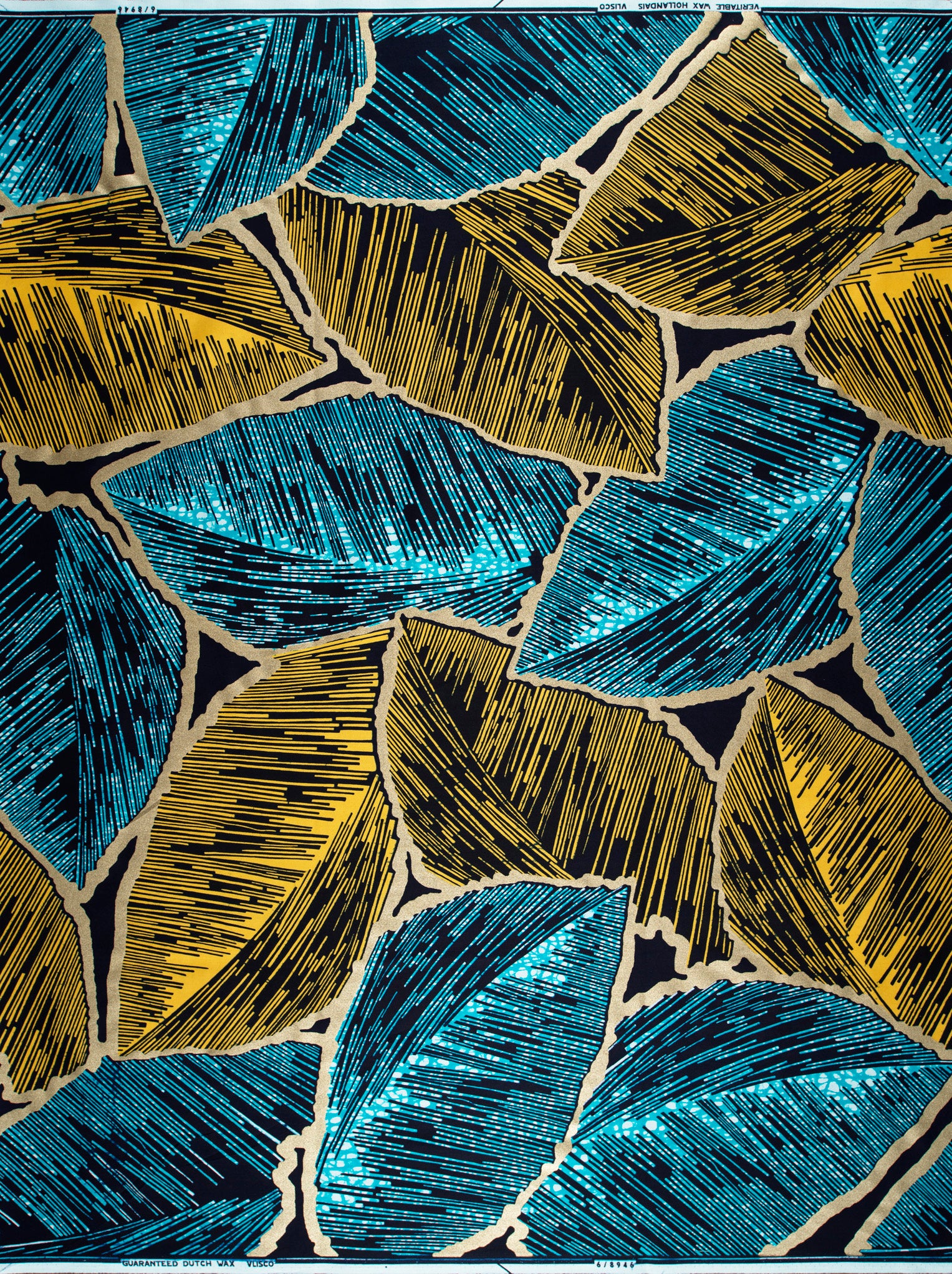 Vibrant blue gold leaf-patterned fabric wax hollandais vl08946.010