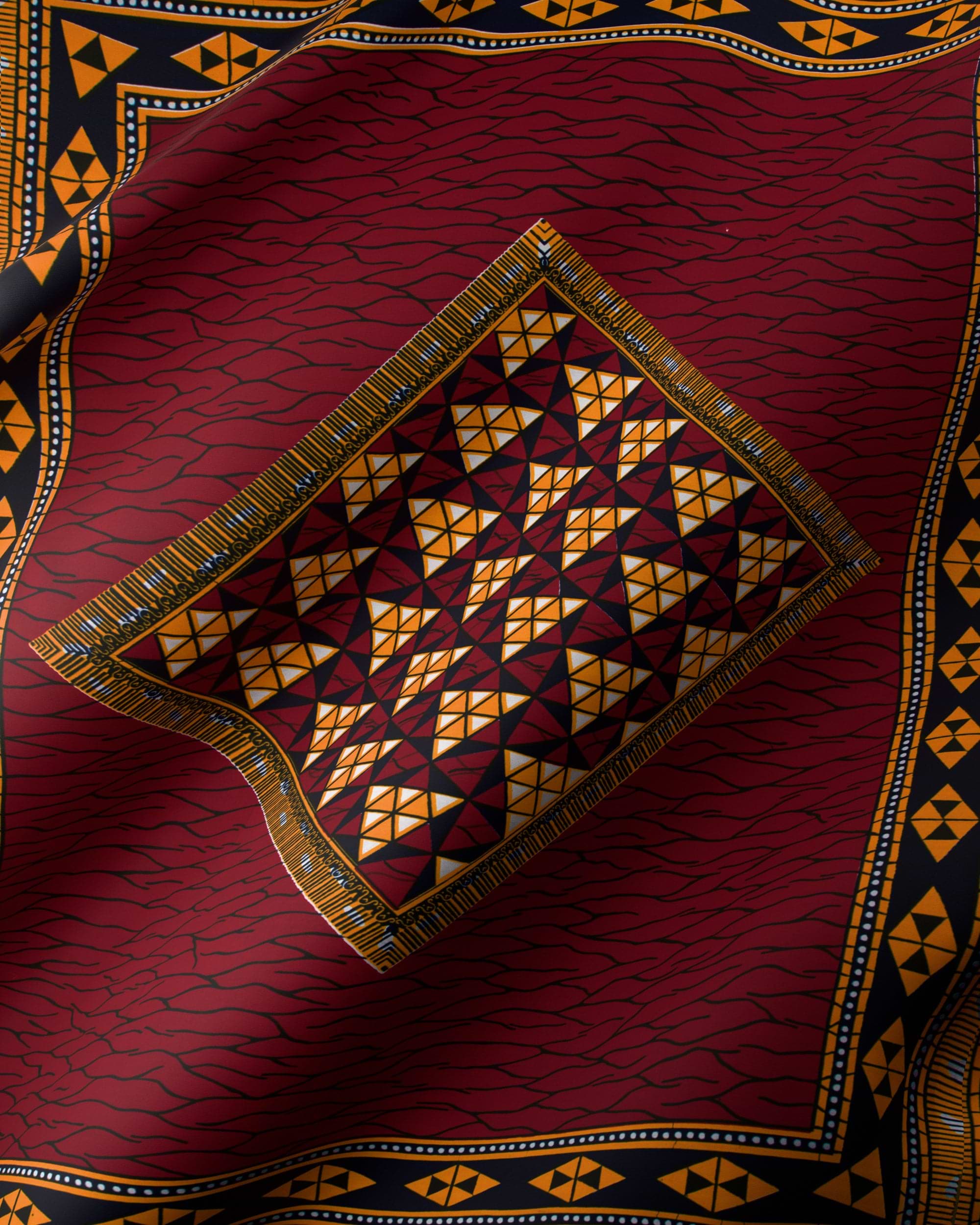 Rich maroon fabric intricate geometric wax hollandais vl49250.049