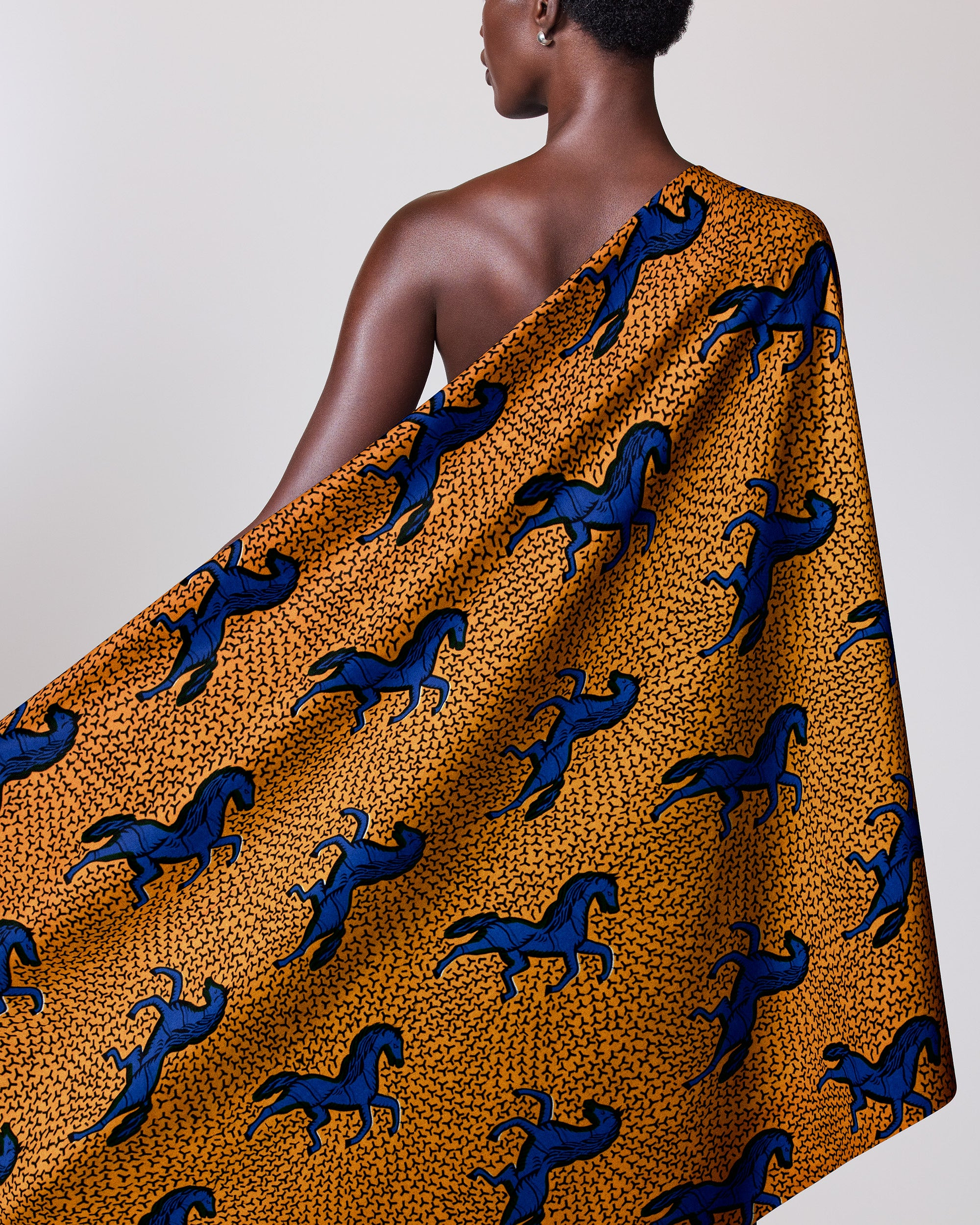 Vibrant orange fabric draped model’s wax hollandais vl53500.113