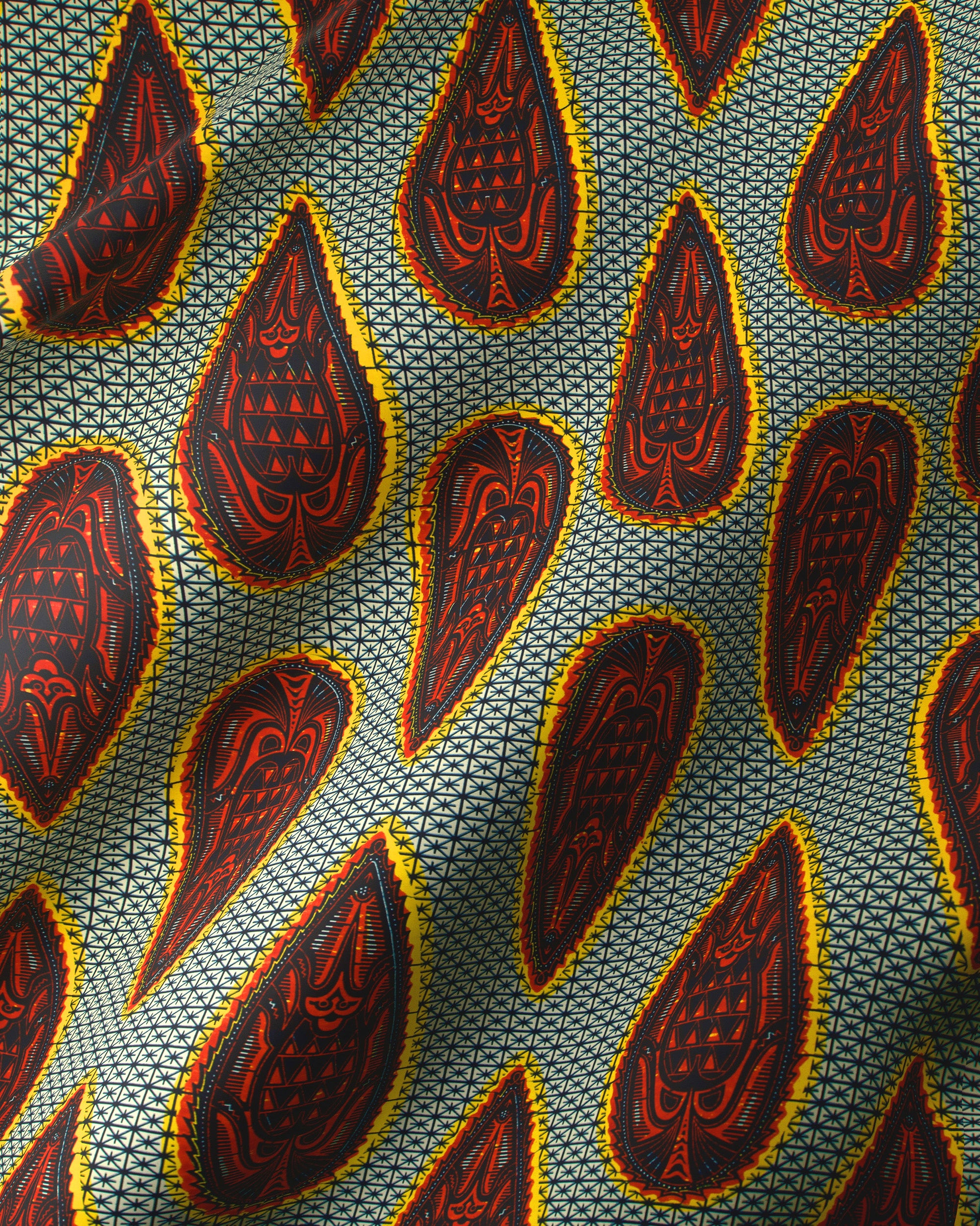 Vibrant red yellow tribal-patterned teardrop wax hollandais vl77150.027