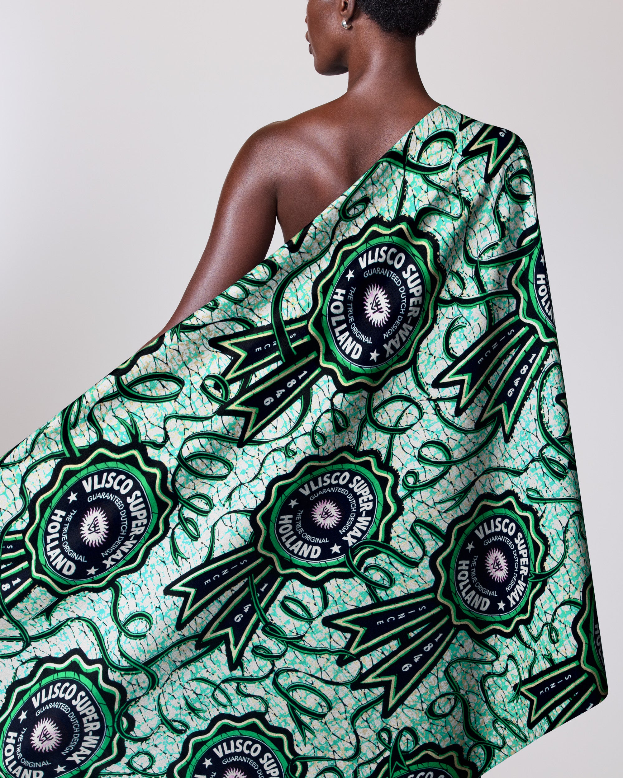 Vibrant green black patterned fabric super-wax vla2117.051