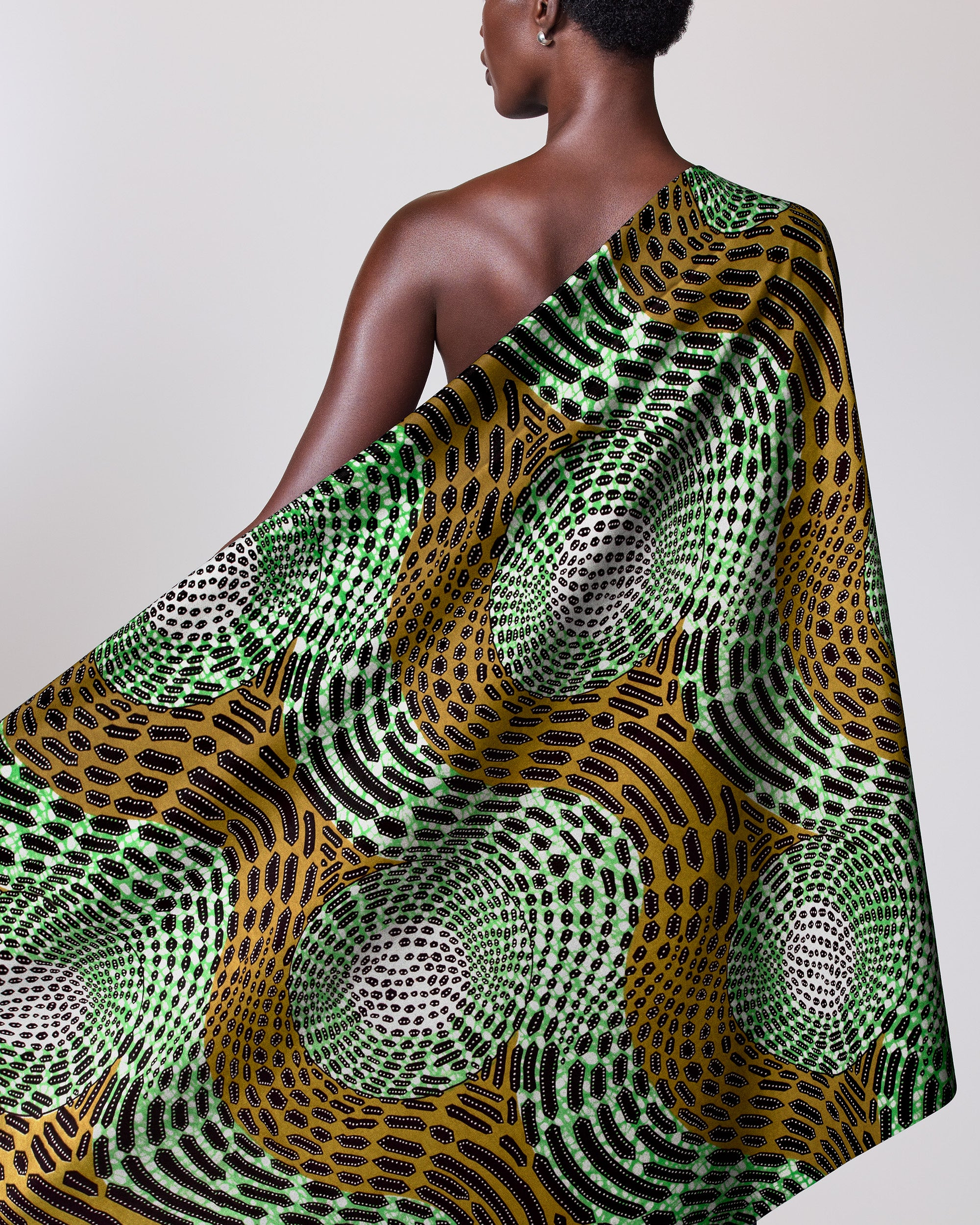 Vibrant green gold patterned fabric wax hollandais vlh1112.011