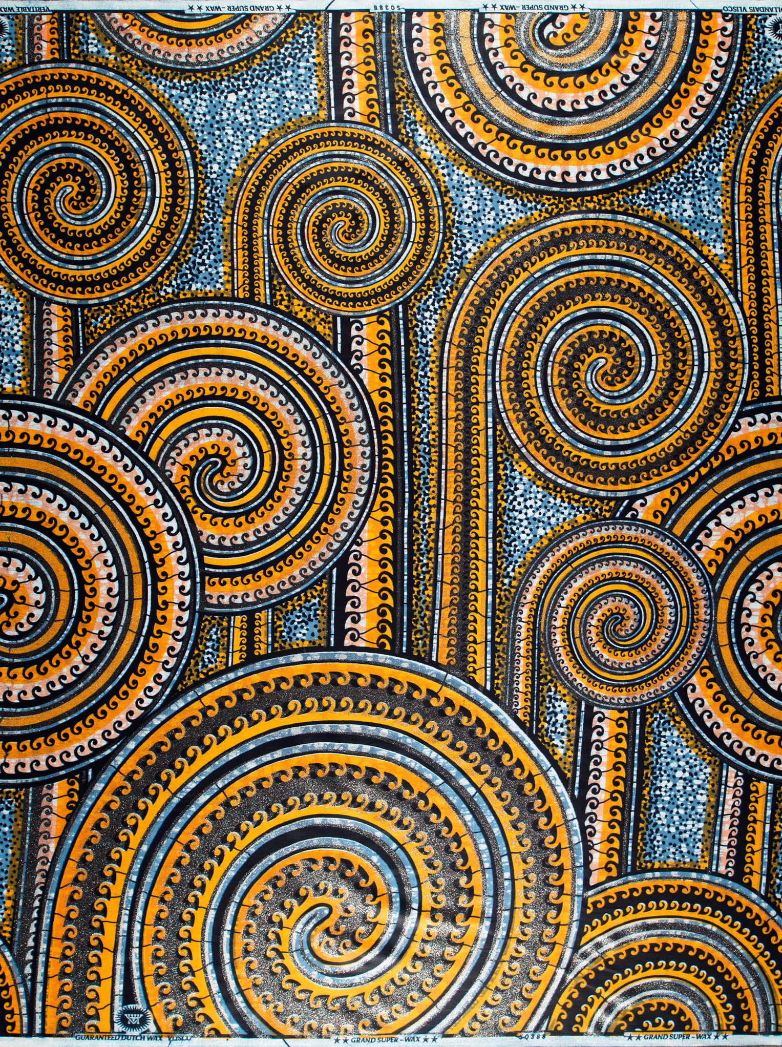 Vibrant orange black spiral-patterned fabric grand super-wax vls0388.006